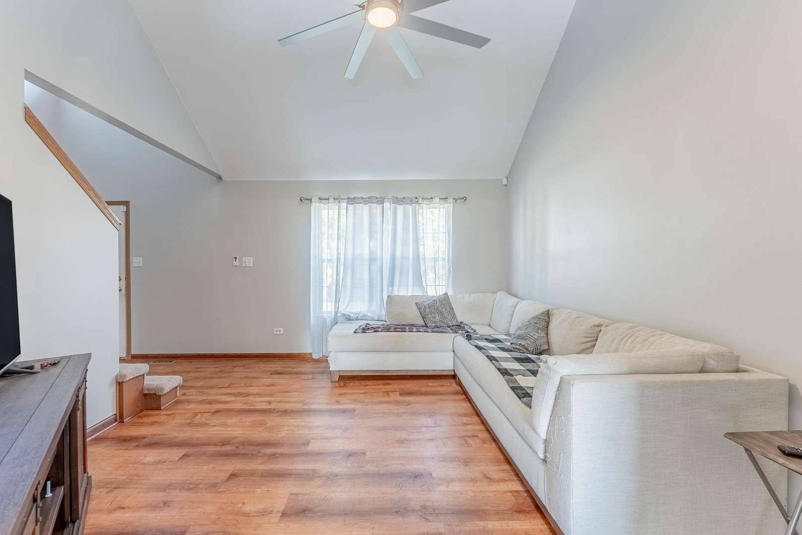 5302 Meadowbrook Street Plainfield, IL 60586 - Photo 6 of 46 a spacious bedroom with a bed and a flat screen tv