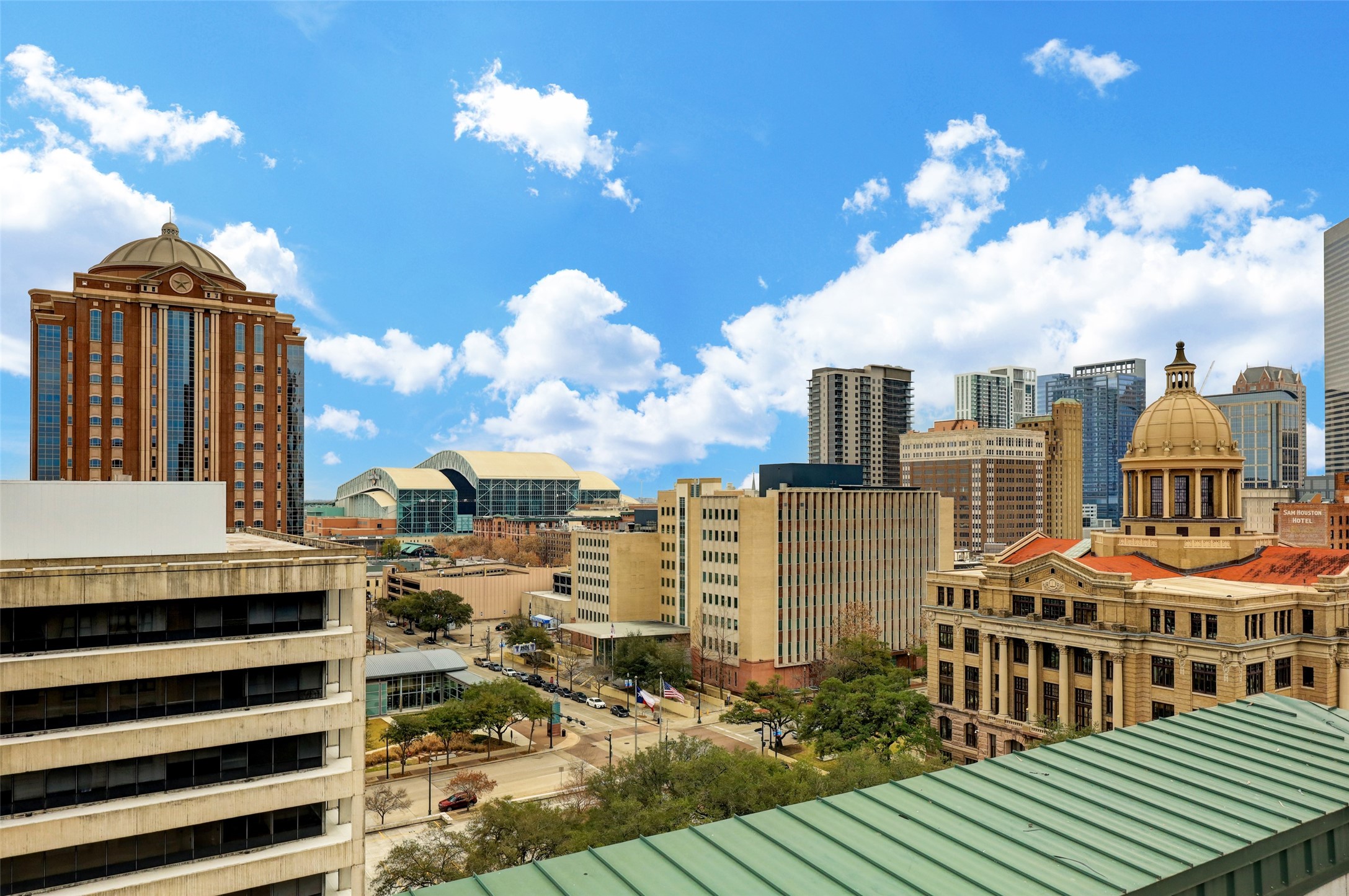 201 Main Street, Unit 6D Houston, TX 77002 - Photo 16 of 24 a front view of a house with a yard