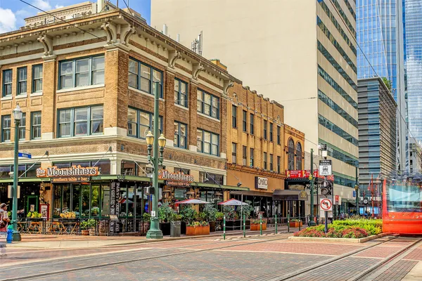 a view of a food market with retail shops