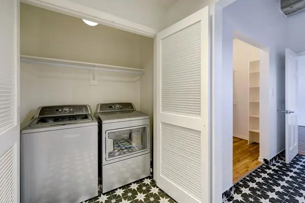 a utility room with dryer and washer