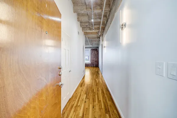 a view of entryway with a white wall