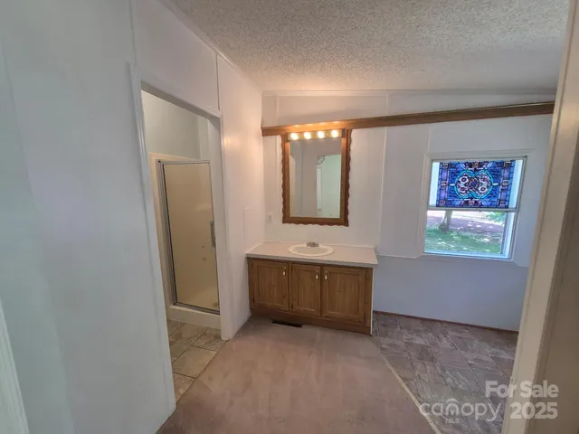 $227,500 | 44112 Harper Hearne Road, New London, NC 28127