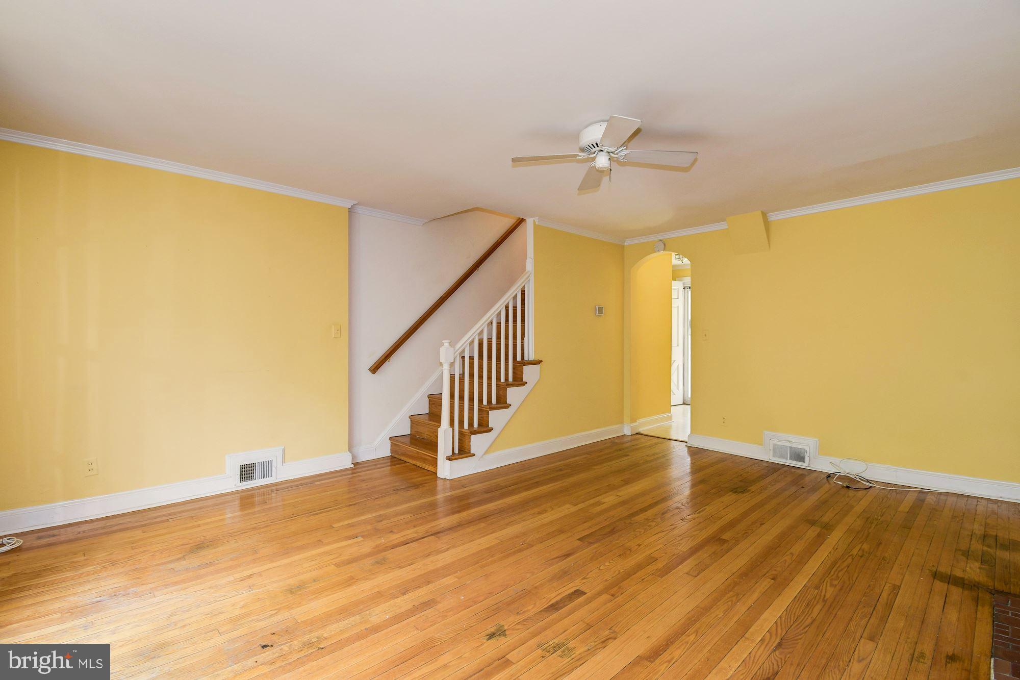 1218 Portner Road Alexandria, VA 22314 - Photo 3 of 31 a view of an empty room with wooden floor
