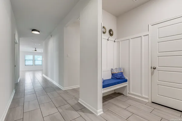 a view of a room with cabinet and entryway