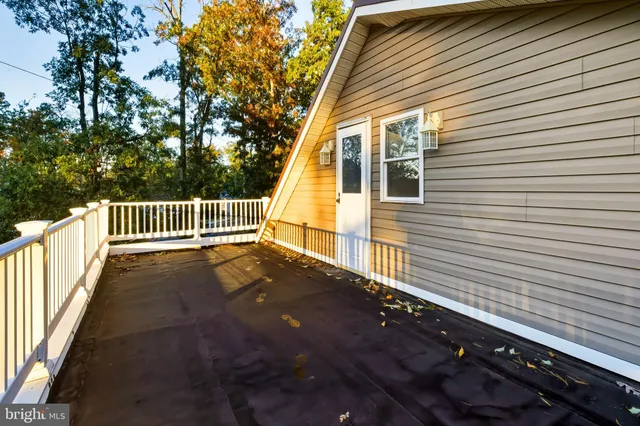 a view of backyard with deck