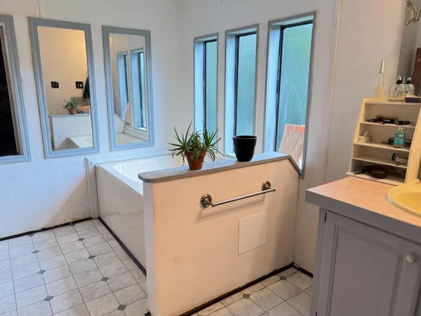 a room with cabinets and wooden floor