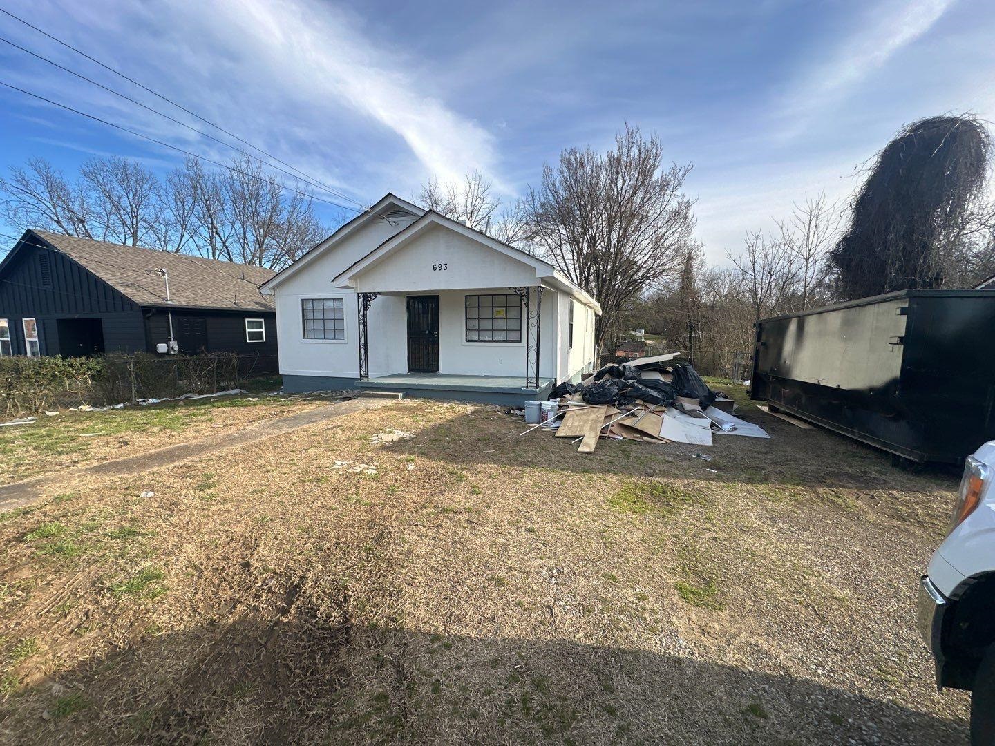 693 Granada Road Memphis, TN 38109 - Photo 1 of 7 a view of a house with a yard