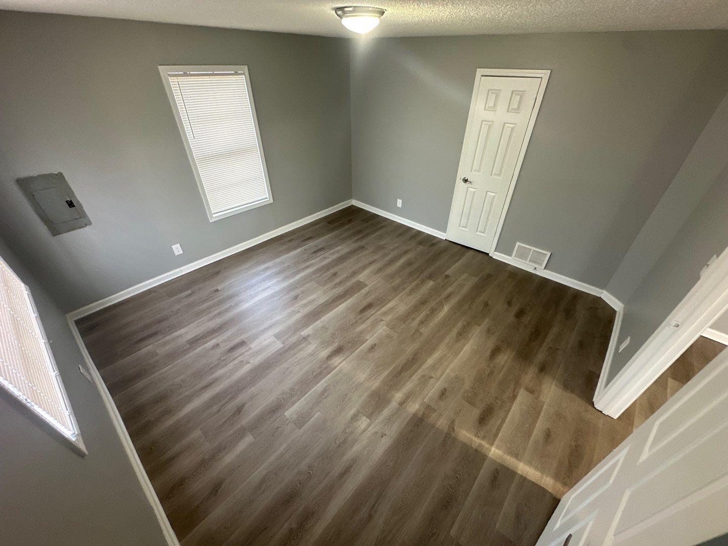 693 Granada Road Memphis, TN 38109 - Photo 6 of 7 a view of empty room with wooden floor