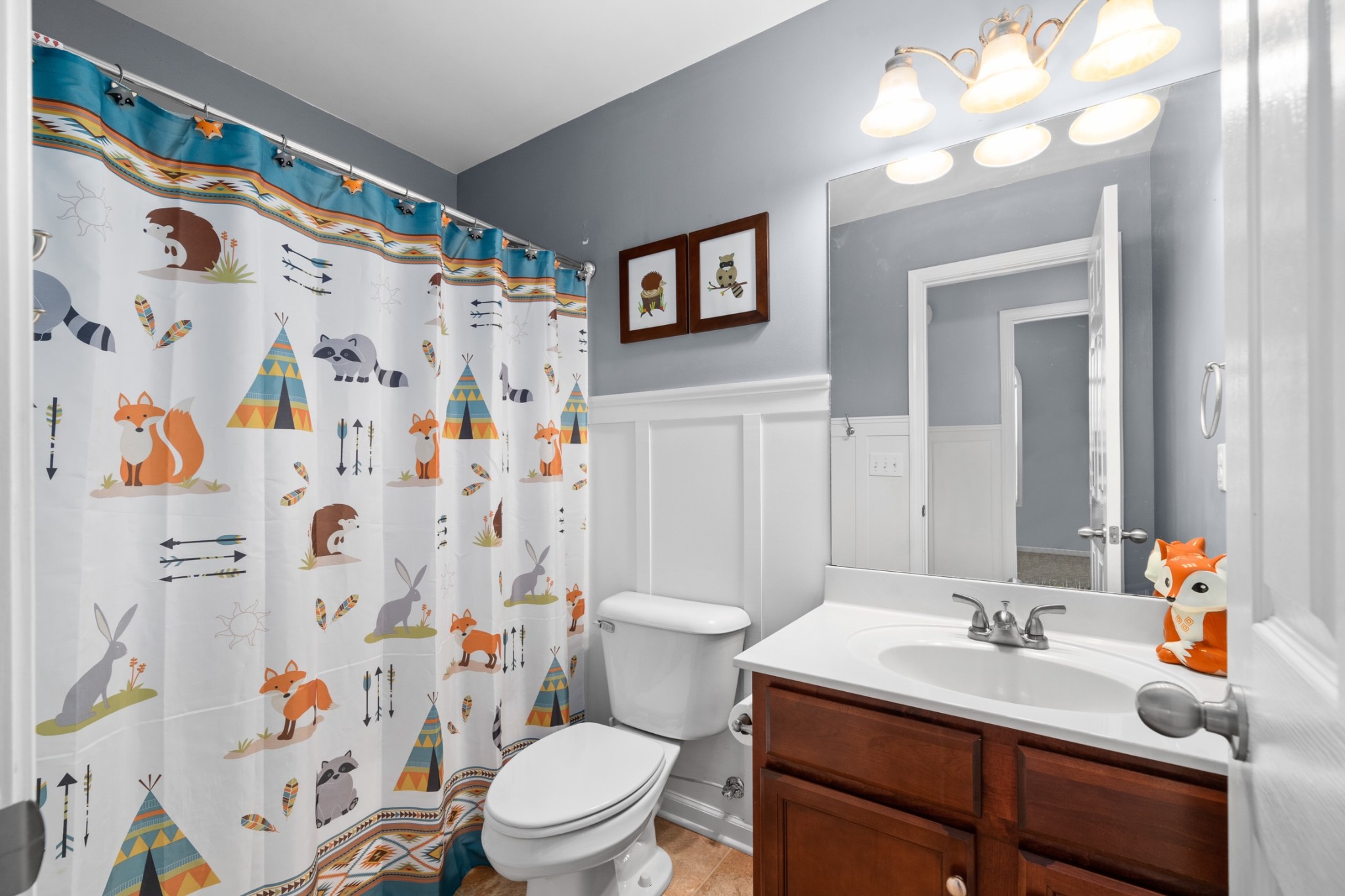 4439 Taylor Road Springfield, TN 37172 - Photo 15 of 29 a bathroom with a sink a toilet and shower curtain