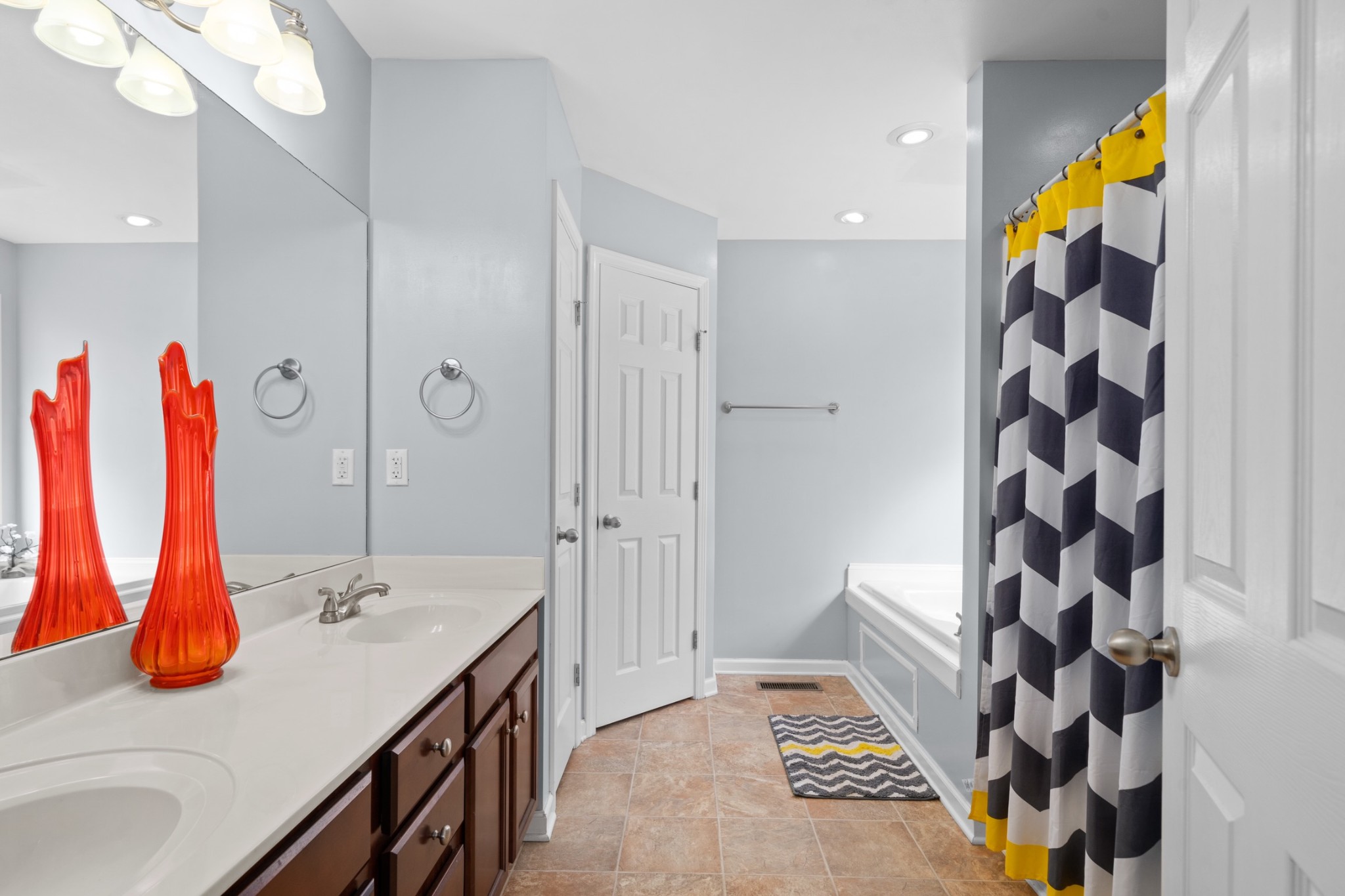4439 Taylor Road Springfield, TN 37172 - Photo 18 of 29 a bathroom with a sink a tub and shower