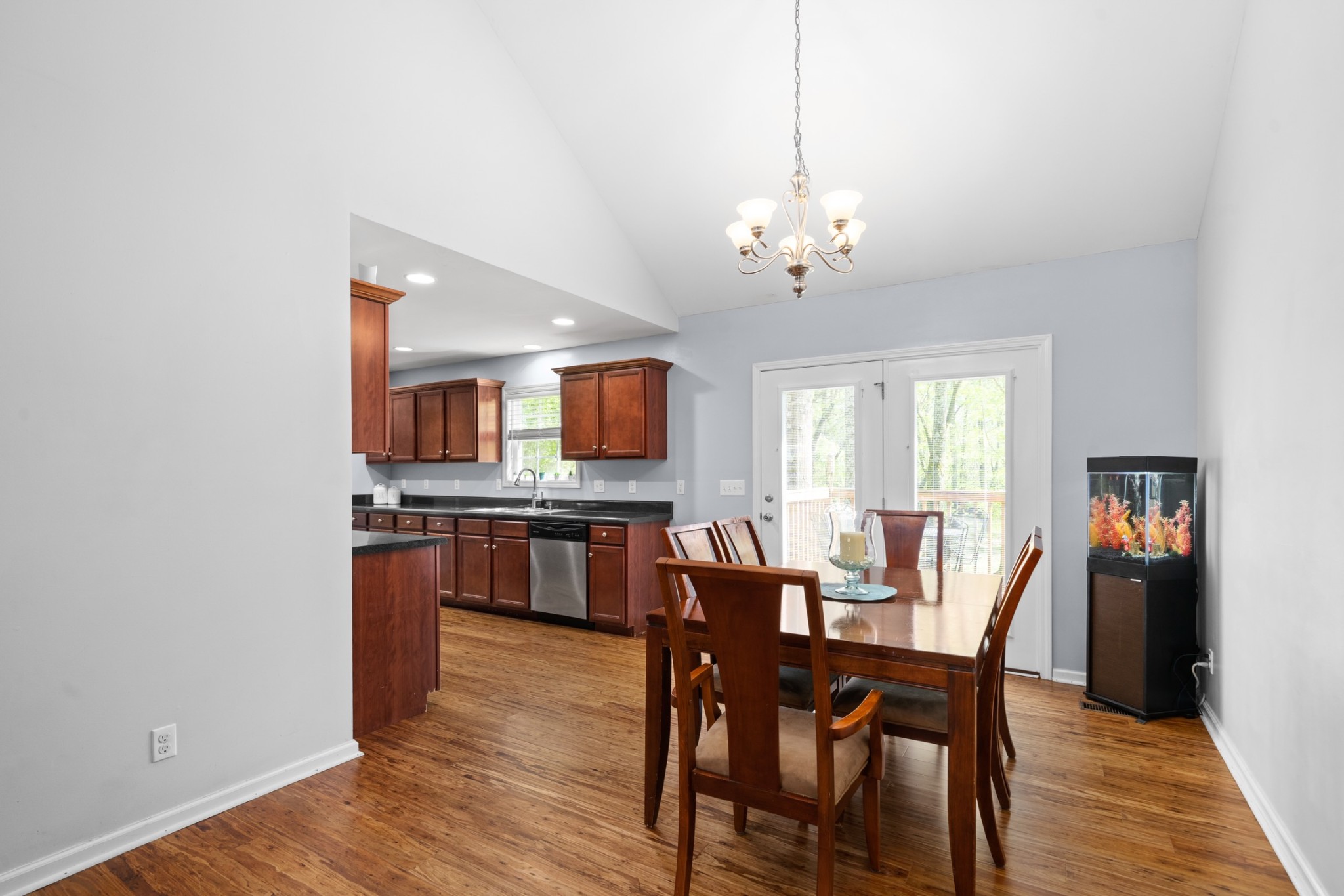 4439 Taylor Road Springfield, TN 37172 - Photo 10 of 29 a view of a dining room with furniture window and wooden floor