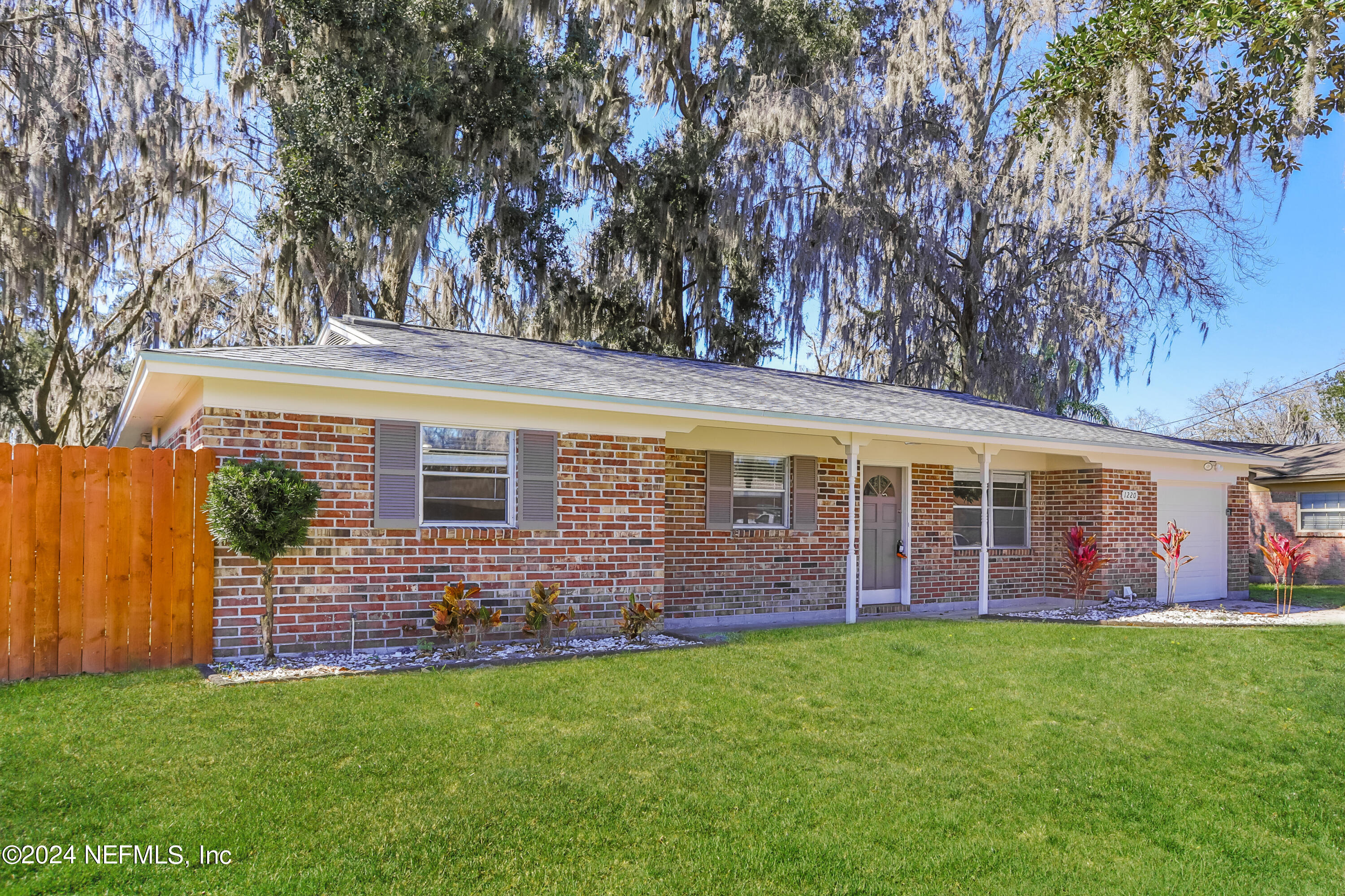1220 Arbor Circle Orange Park, FL 32073 - Photo 1 of 15 front view of a house with a yard