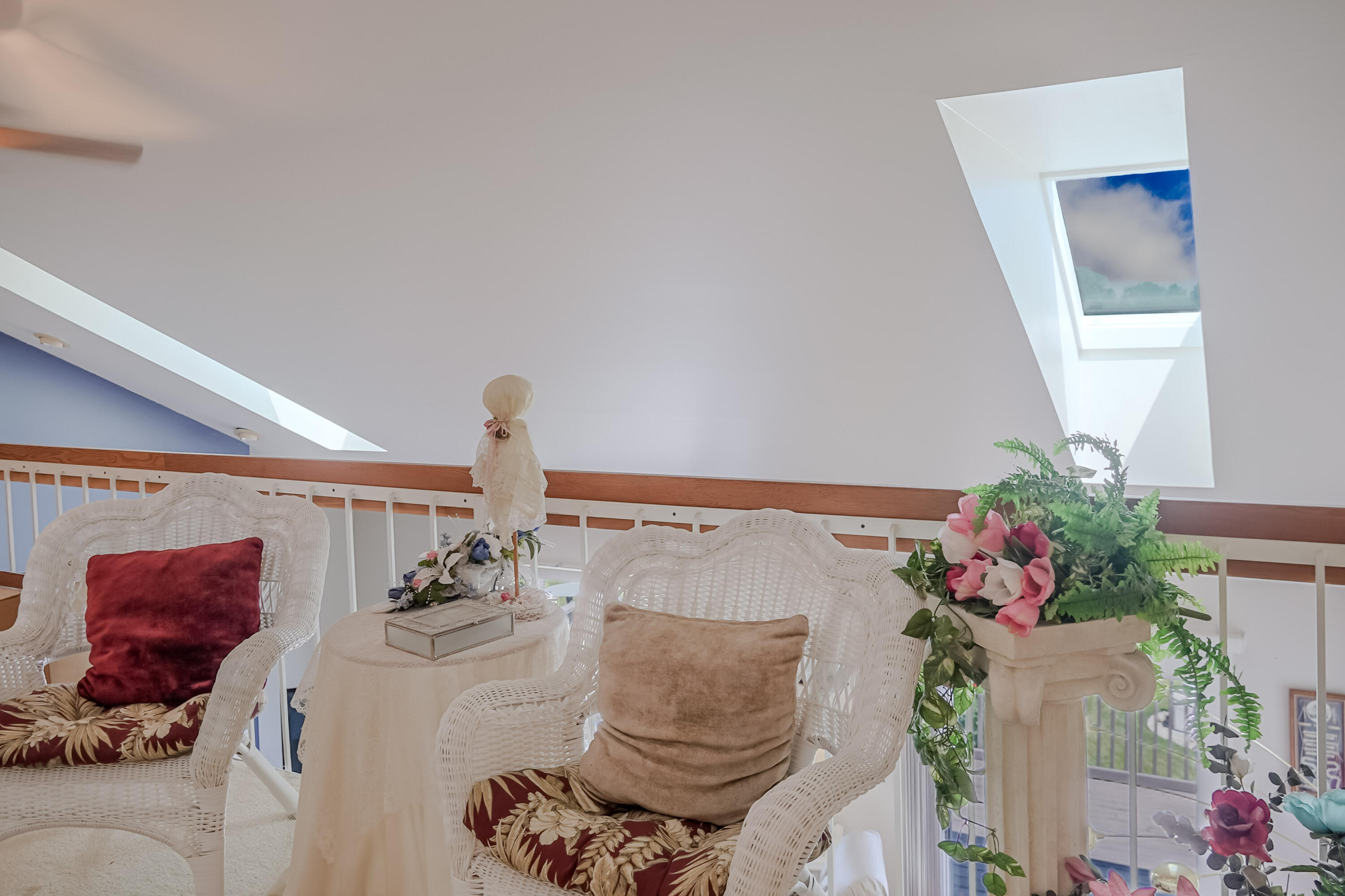 5065 Spinnaker Lane, Unit D Crown Point, IN 46307 - Photo 25 of 42 a living room with furniture and flowers