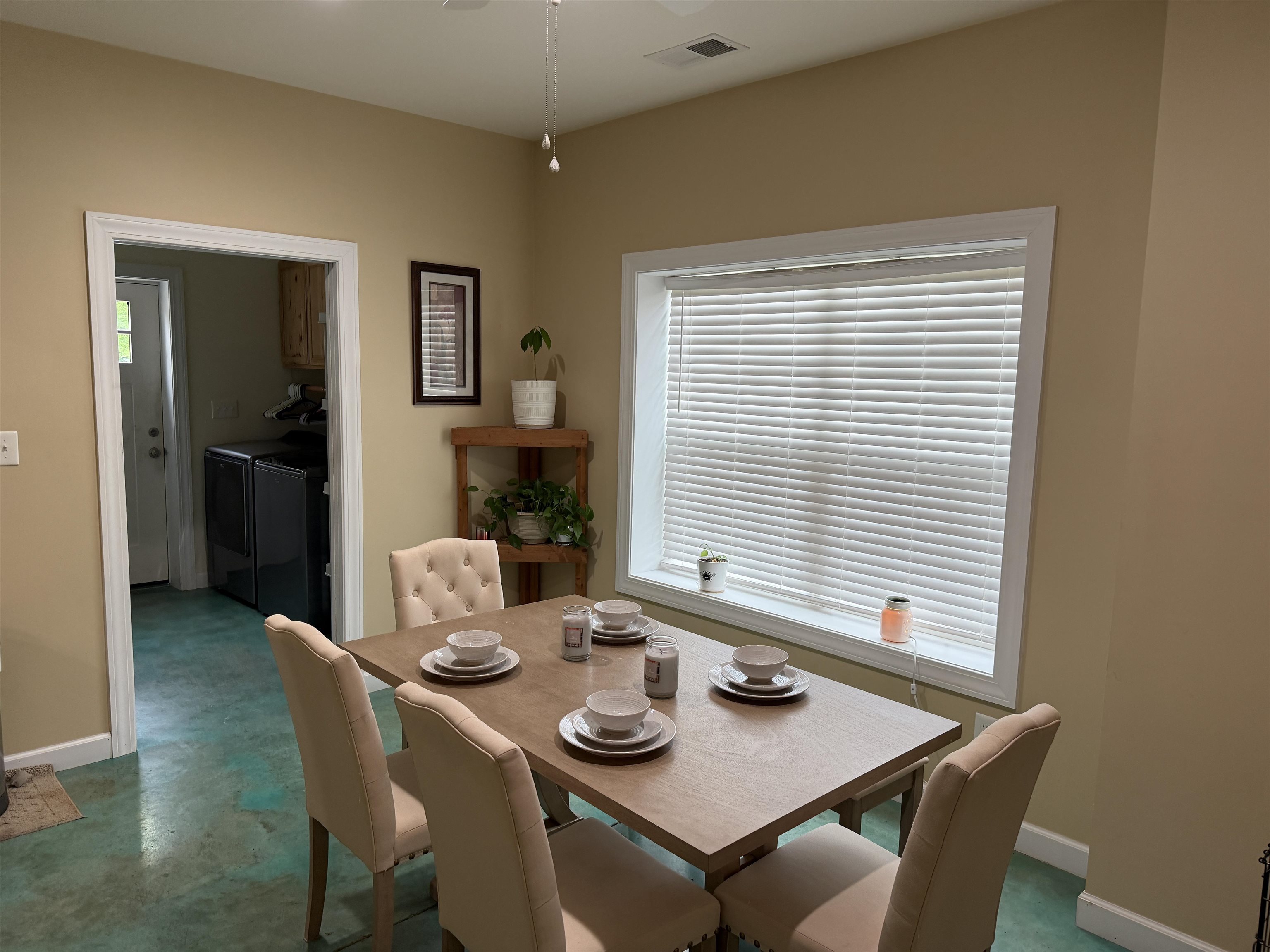 710 Harlon Iron Road Morris Chapel, TN 38361 - Photo 16 of 40 a view of a dining room with furniture and window