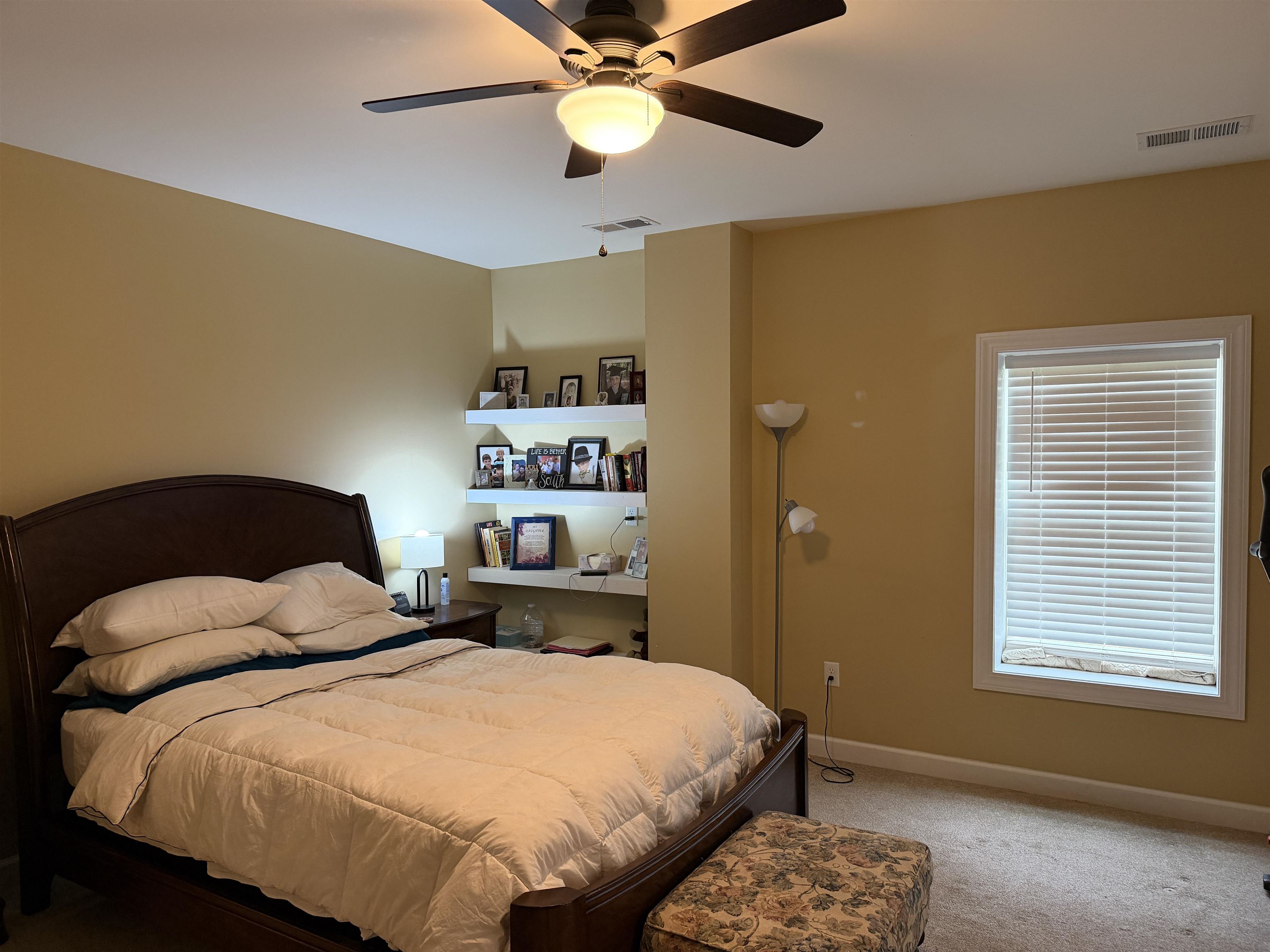 710 Harlon Iron Road Morris Chapel, TN 38361 - Photo 21 of 40 a bedroom with a bed and window
