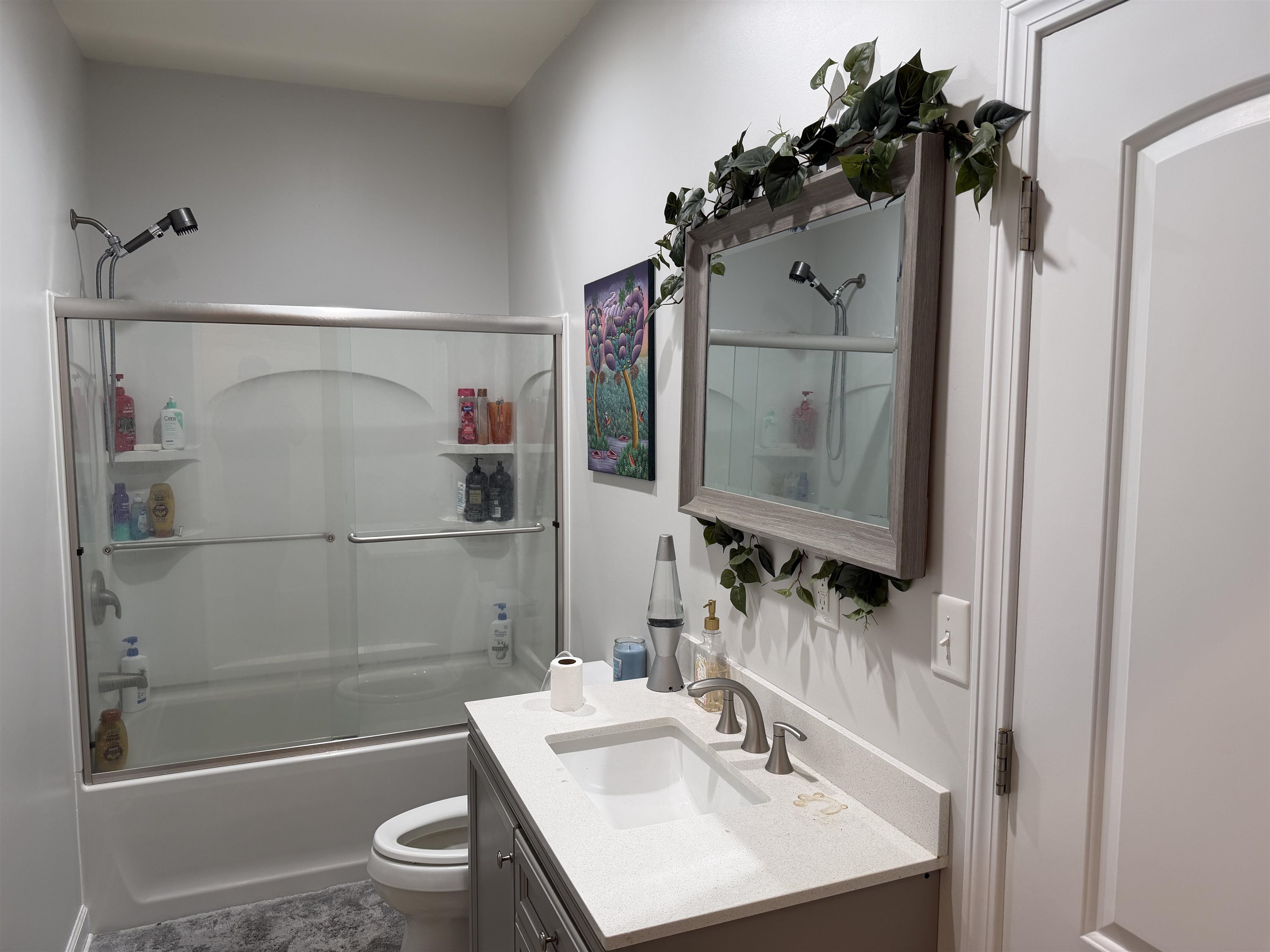 710 Harlon Iron Road Morris Chapel, TN 38361 - Photo 25 of 40 a bathroom with a sink toilet and shower