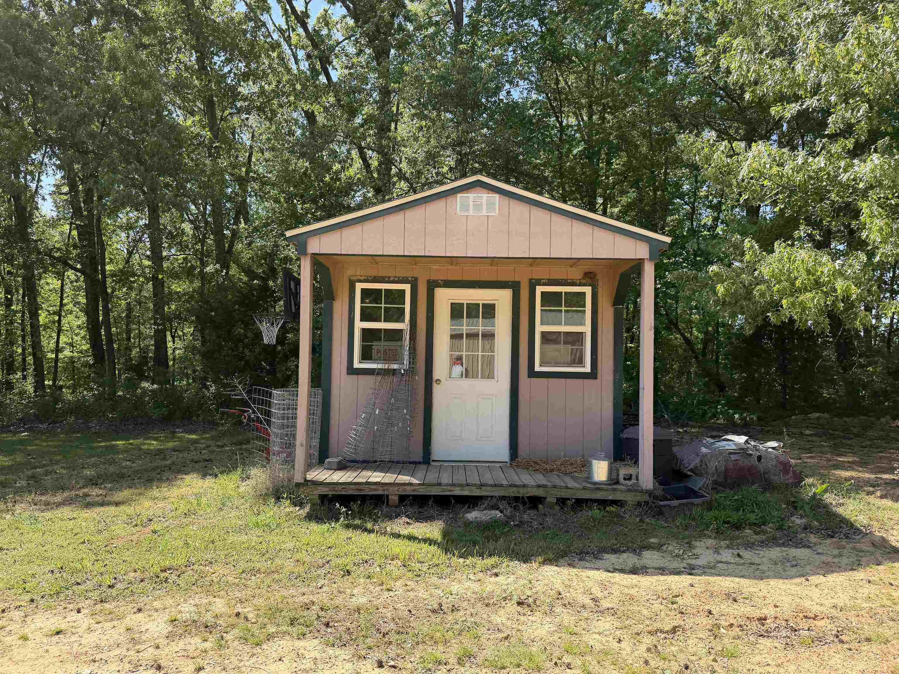 710 Harlon Iron Road Morris Chapel, TN 38361 - Photo 28 of 40 a view of a house with backyard
