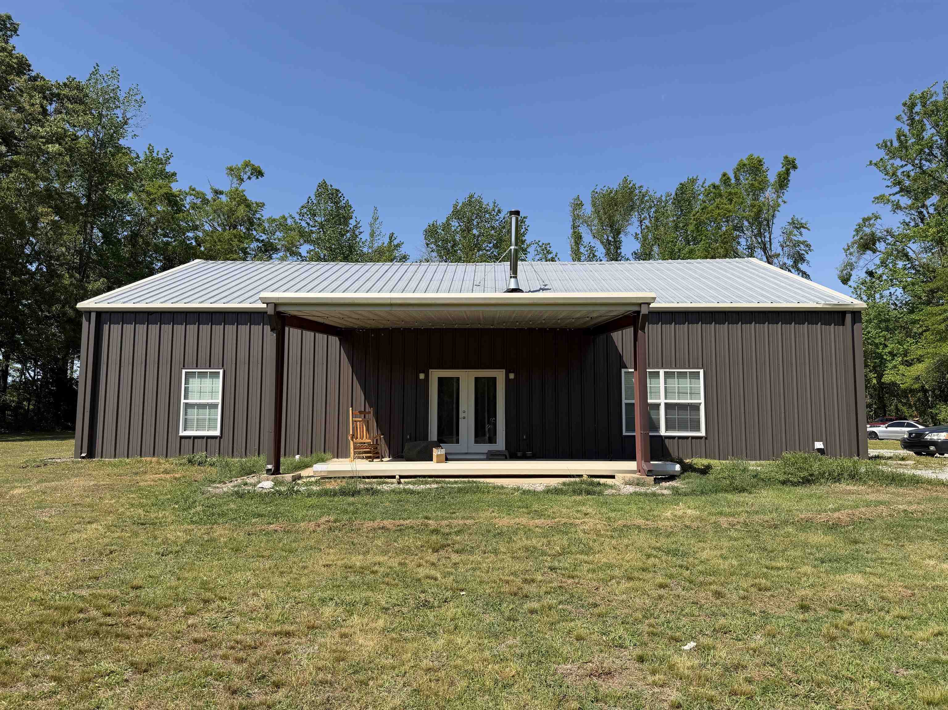 710 Harlon Iron Road Morris Chapel, TN 38361 - Photo 3 of 40 a front view of a house with a yard