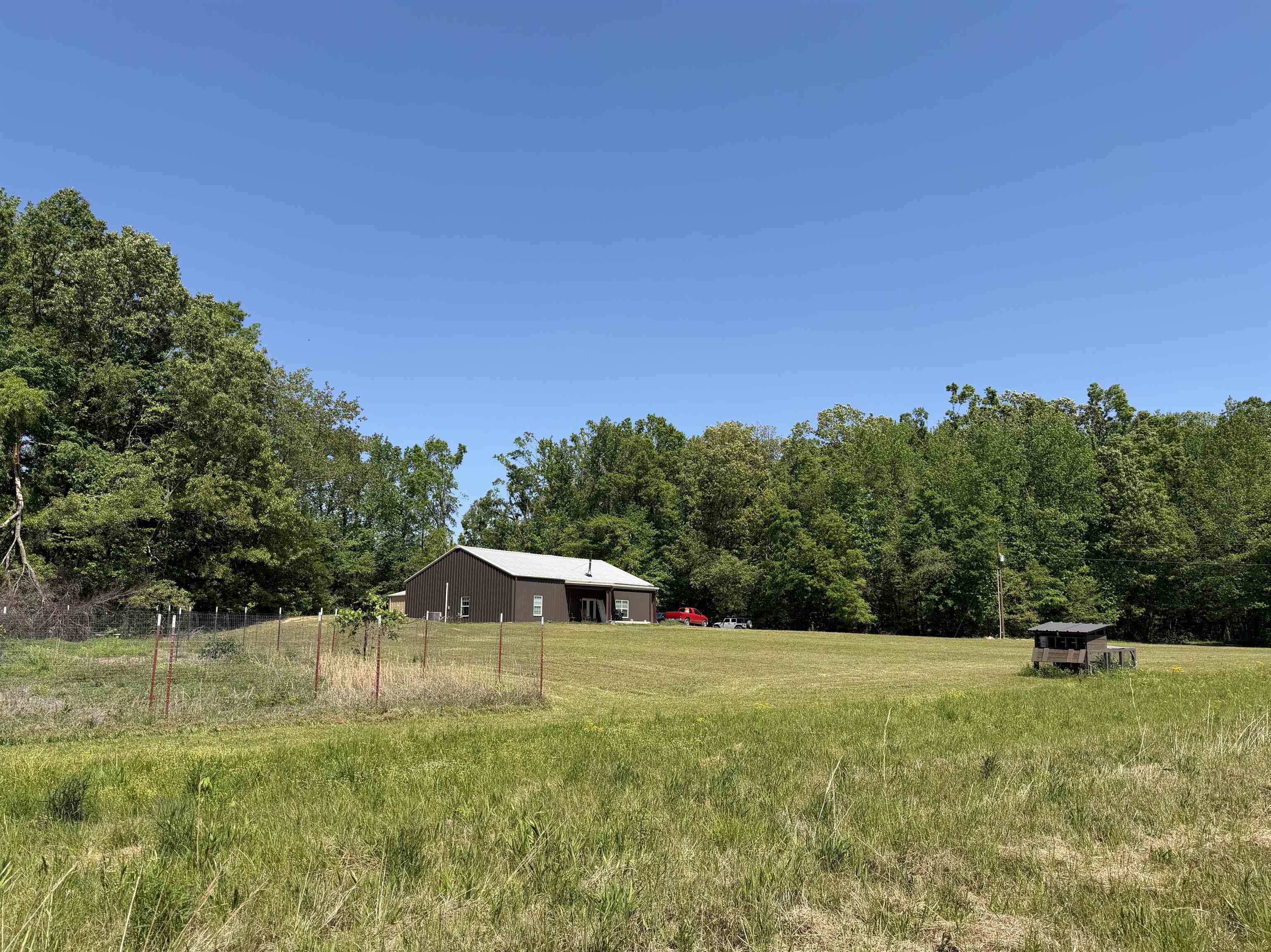 710 Harlon Iron Road Morris Chapel, TN 38361 - Photo 31 of 40 a view of a house with a yard