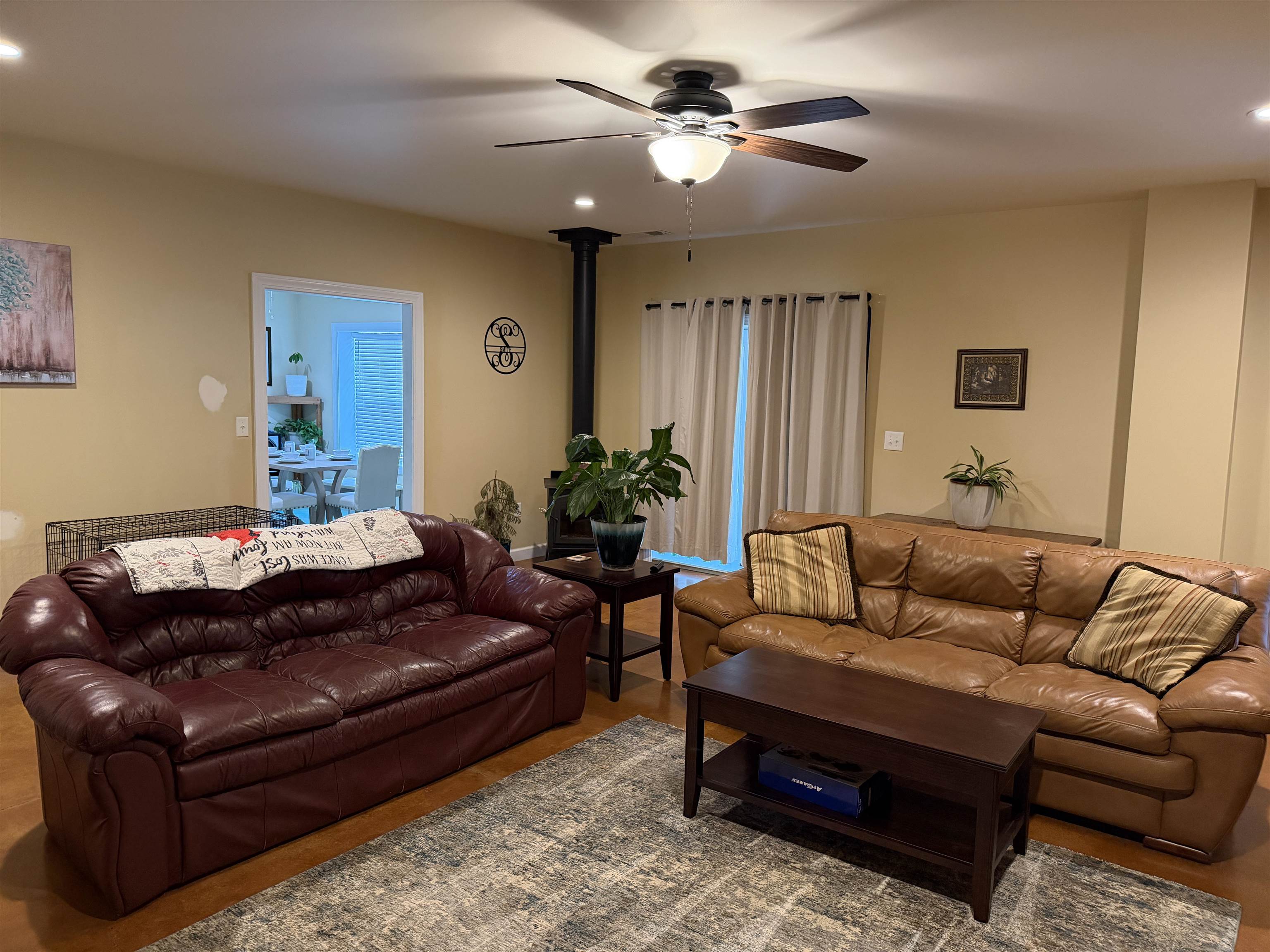 710 Harlon Iron Road Morris Chapel, TN 38361 - Photo 10 of 40 a living room with furniture and a ceiling fan