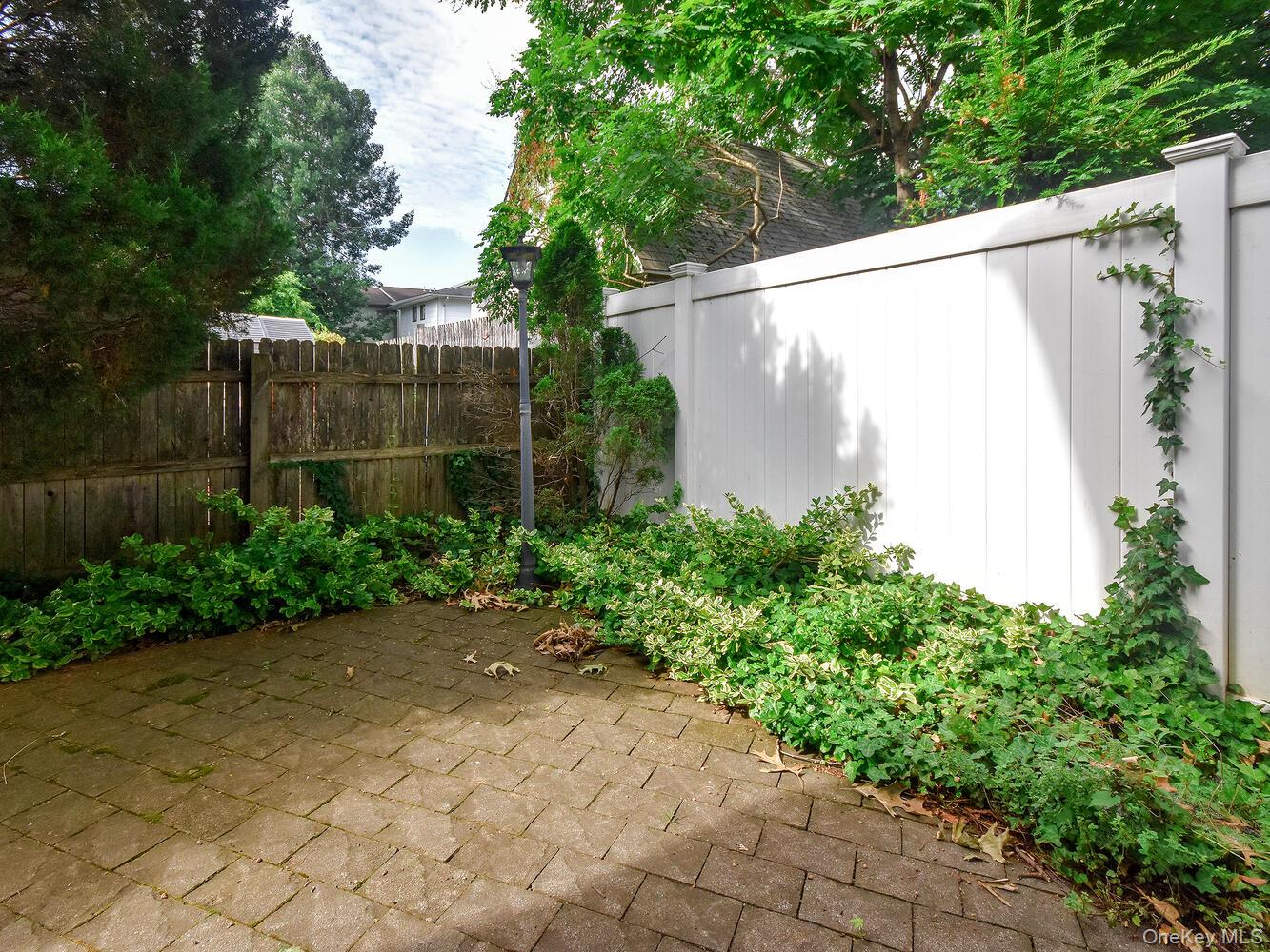 49 Ashwood Road, Unit A Port Washington, NY 11050 - Photo 20 of 20 Fenced in Yard