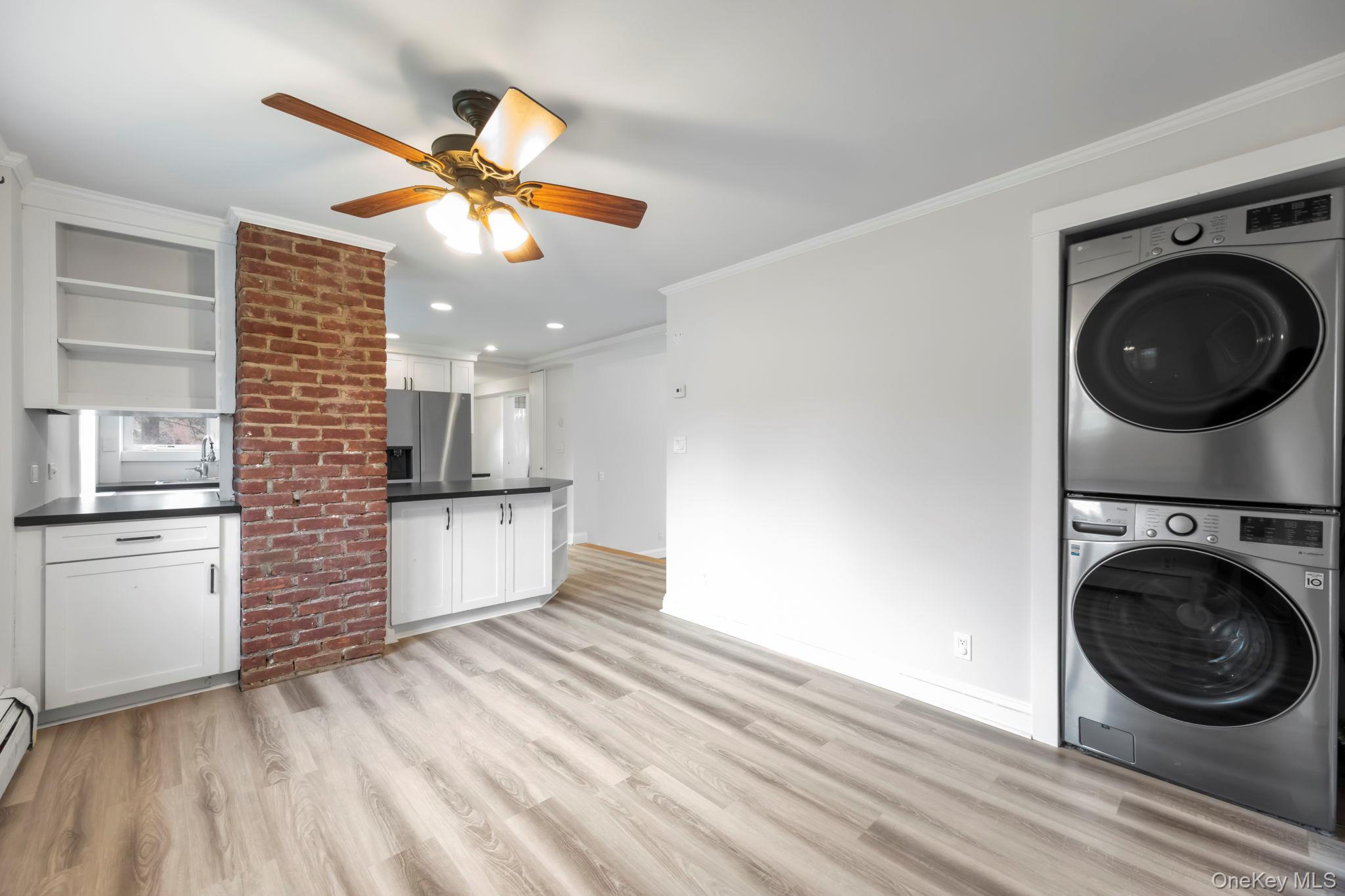 18 Lakeview Road Carmel, NY 10512 - Photo 14 of 44 a view of a kitchen with a stove cabinets and a wooden floor