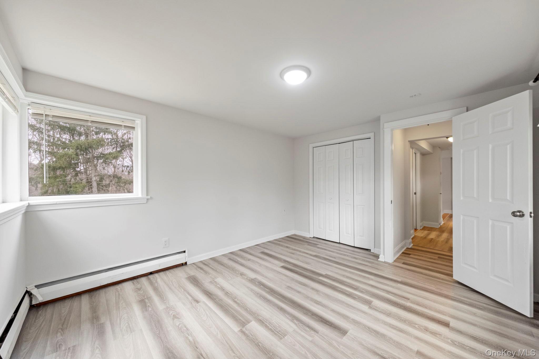 18 Lakeview Road Carmel, NY 10512 - Photo 16 of 44 a view of a room with wooden floor and window