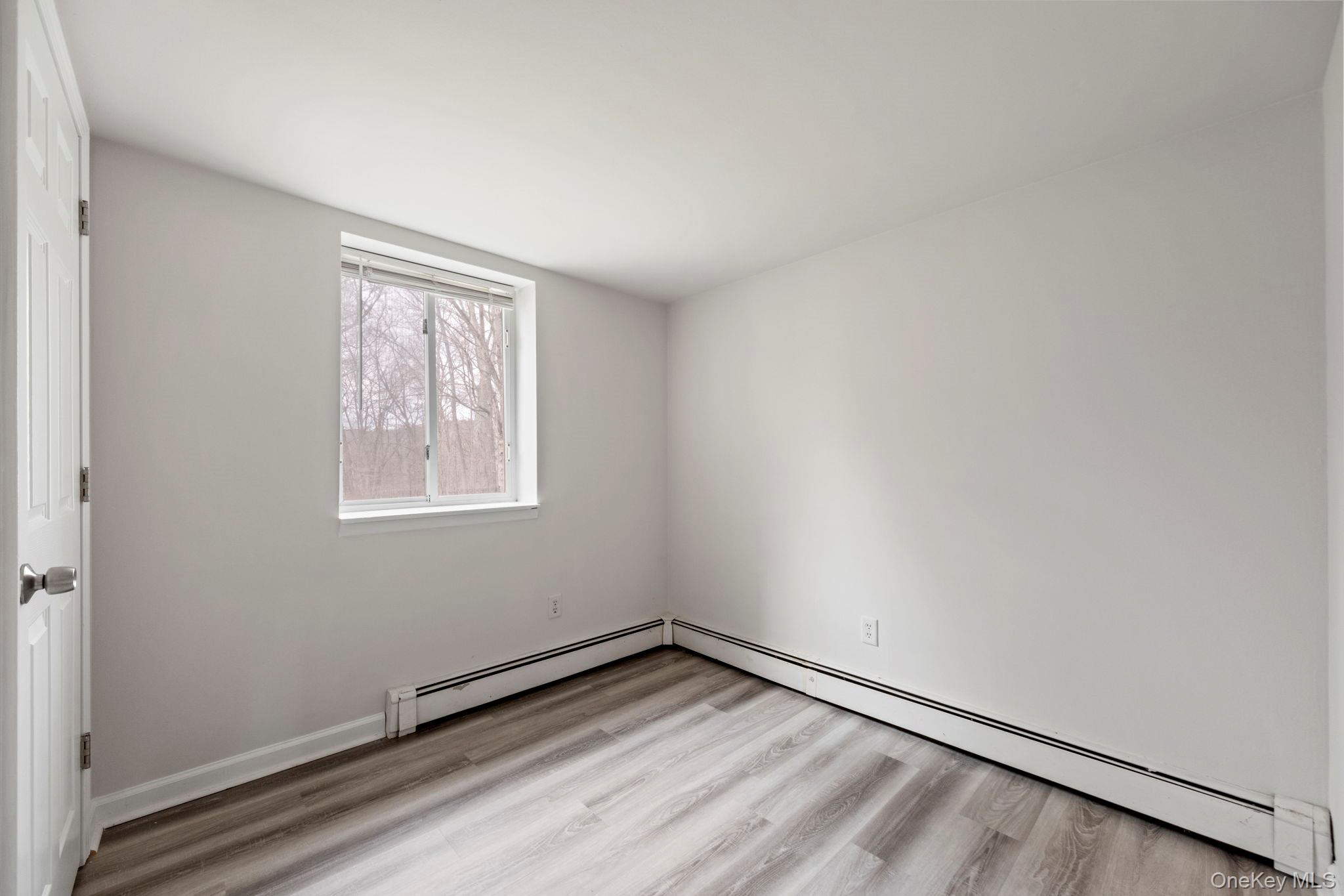 18 Lakeview Road Carmel, NY 10512 - Photo 21 of 44 an empty room with a window