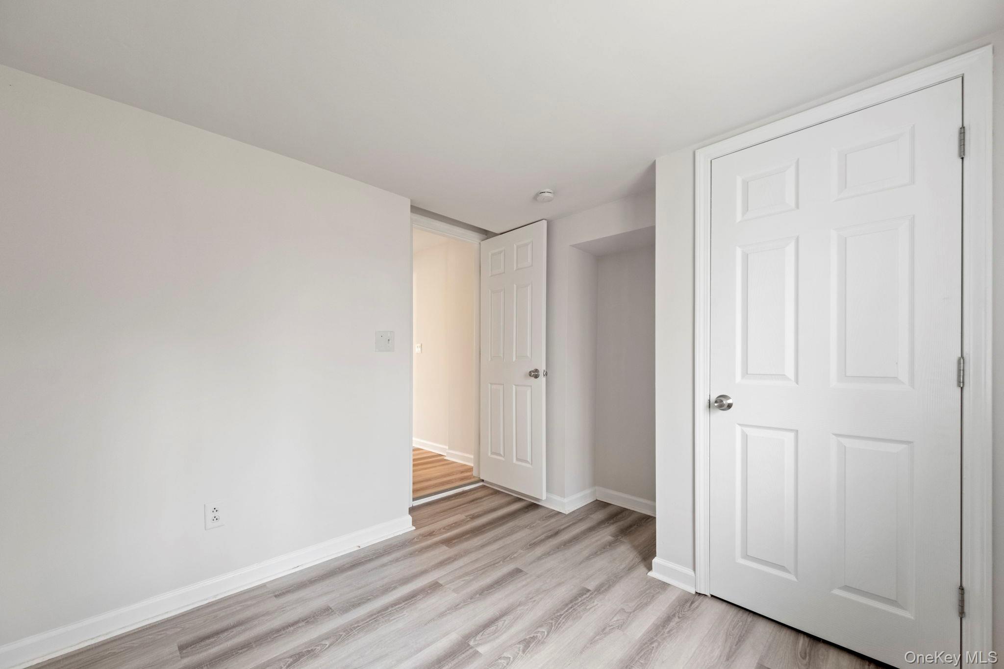 18 Lakeview Road Carmel, NY 10512 - Photo 22 of 44 a view of an empty room and wooden floor