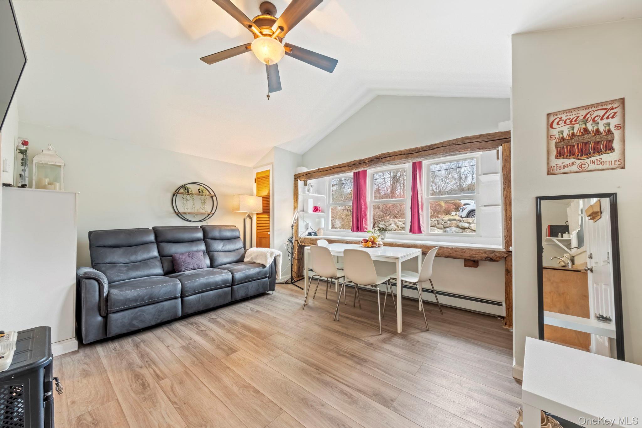 18 Lakeview Road Carmel, NY 10512 - Photo 29 of 44 a living room with furniture and a large window