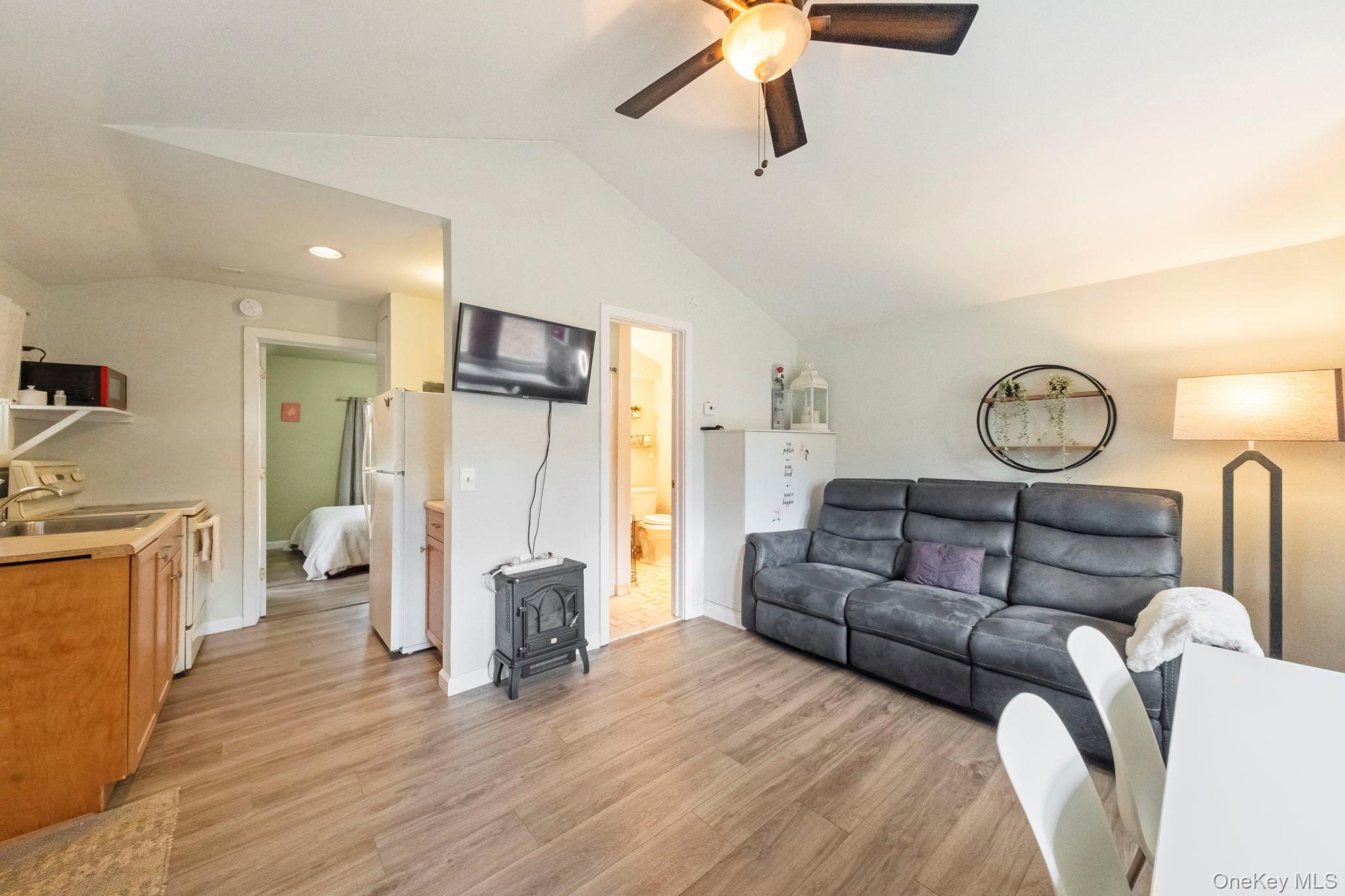 18 Lakeview Road Carmel, NY 10512 - Photo 30 of 44 a living room with furniture and a wooden floor