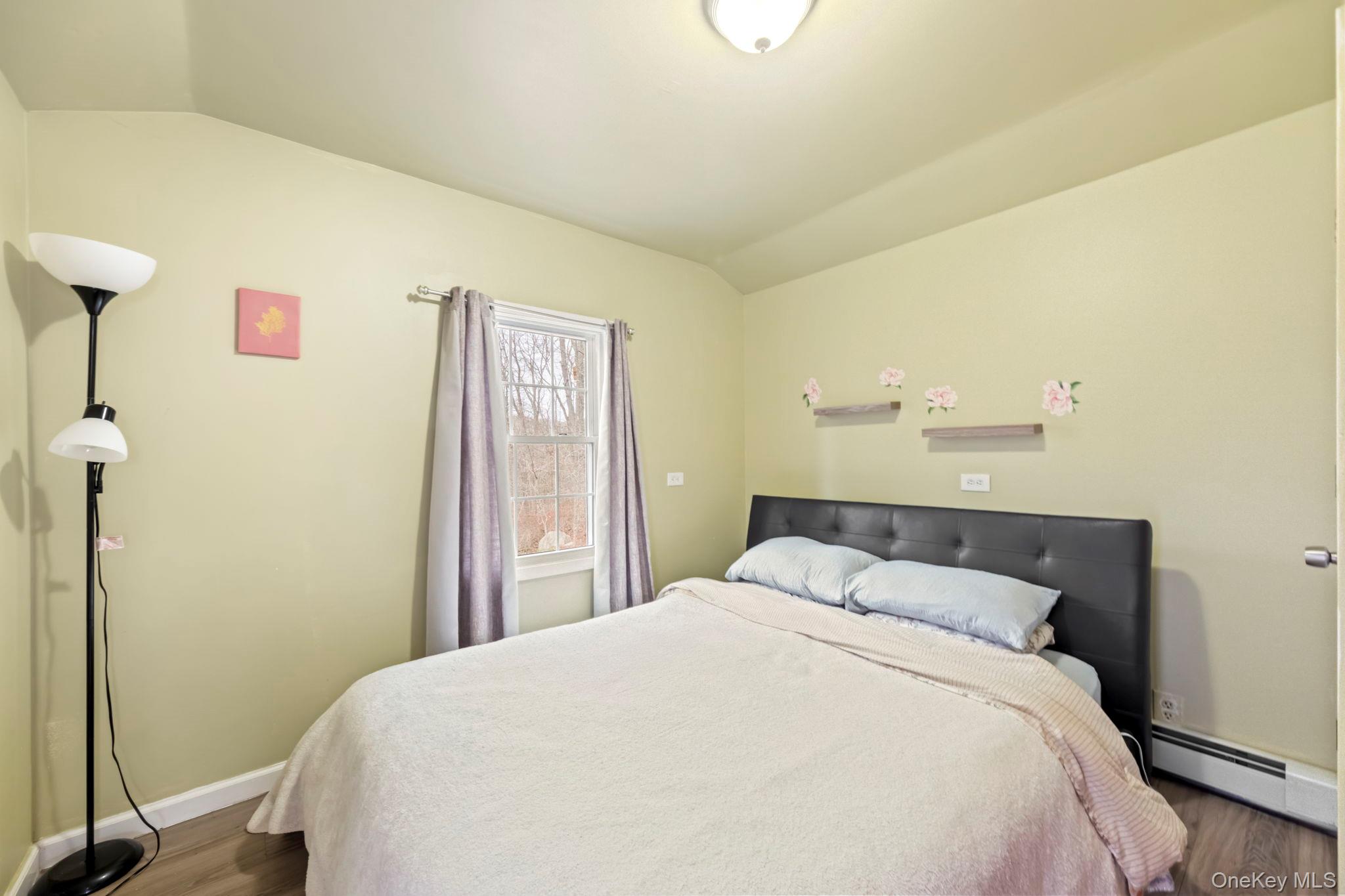 18 Lakeview Road Carmel, NY 10512 - Photo 35 of 44 a large bed in a bedroom next to a window