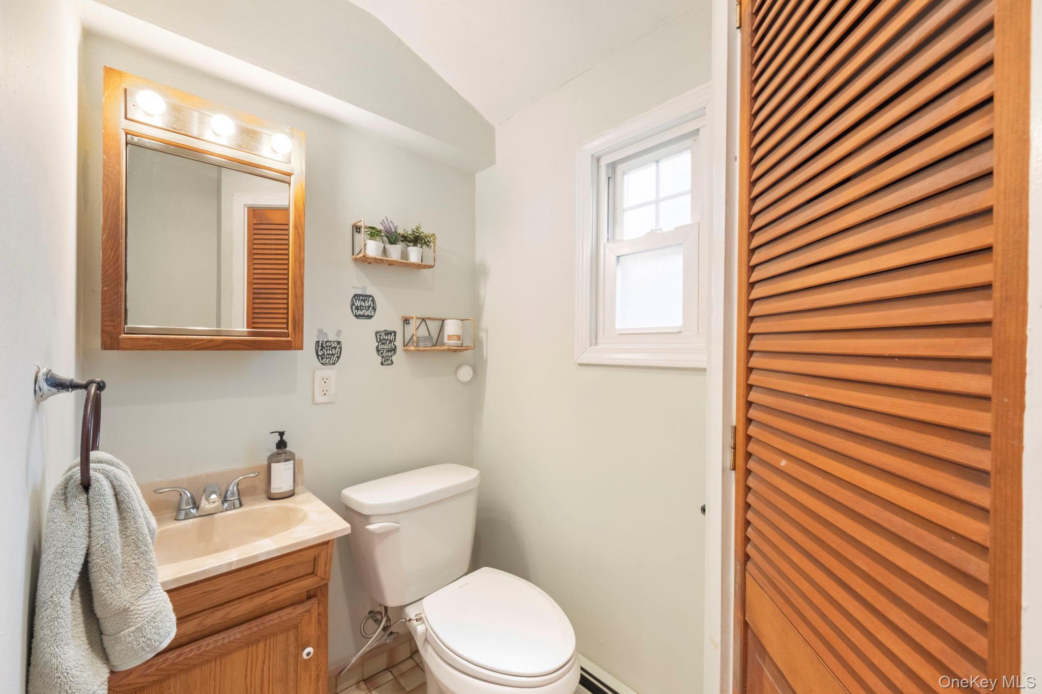 18 Lakeview Road Carmel, NY 10512 - Photo 36 of 44 a white toilet sitting next to a bathroom sink