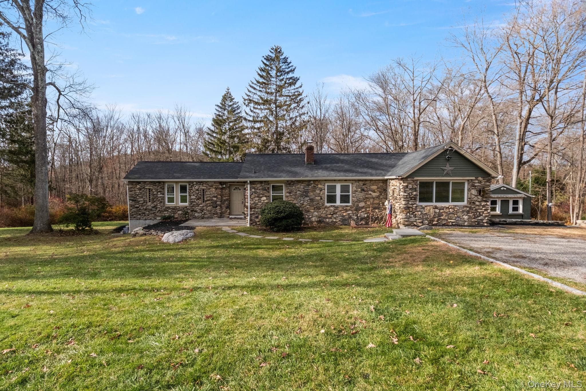 18 Lakeview Road Carmel, NY 10512 - Photo 5 of 44 a front view of house with yard seating and green space