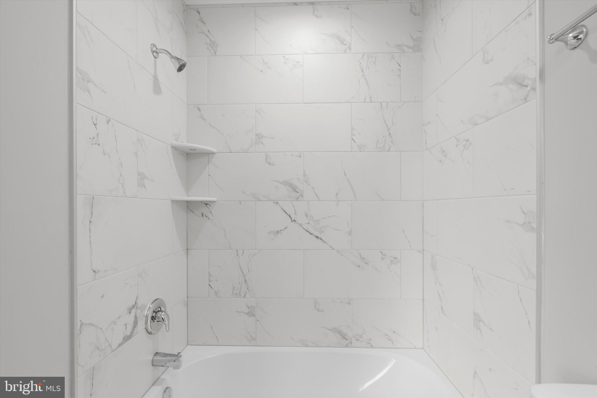 211 Greenland Beach Road Greenland Beach, MD 21226 - Photo 13 of 48 a bathroom with a bathtub