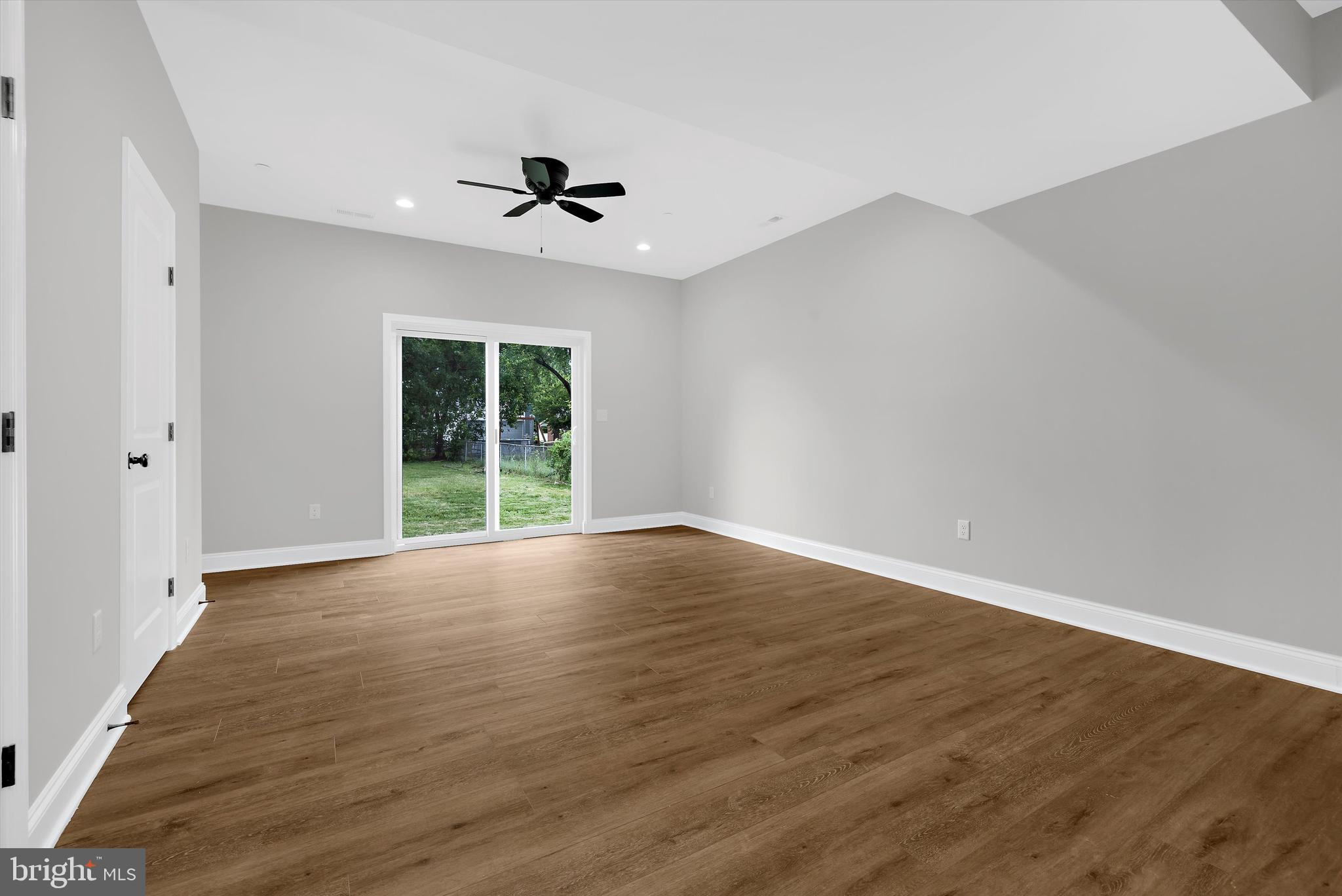 211 Greenland Beach Road Greenland Beach, MD 21226 - Photo 19 of 48 sliders leading to backyard from lower level