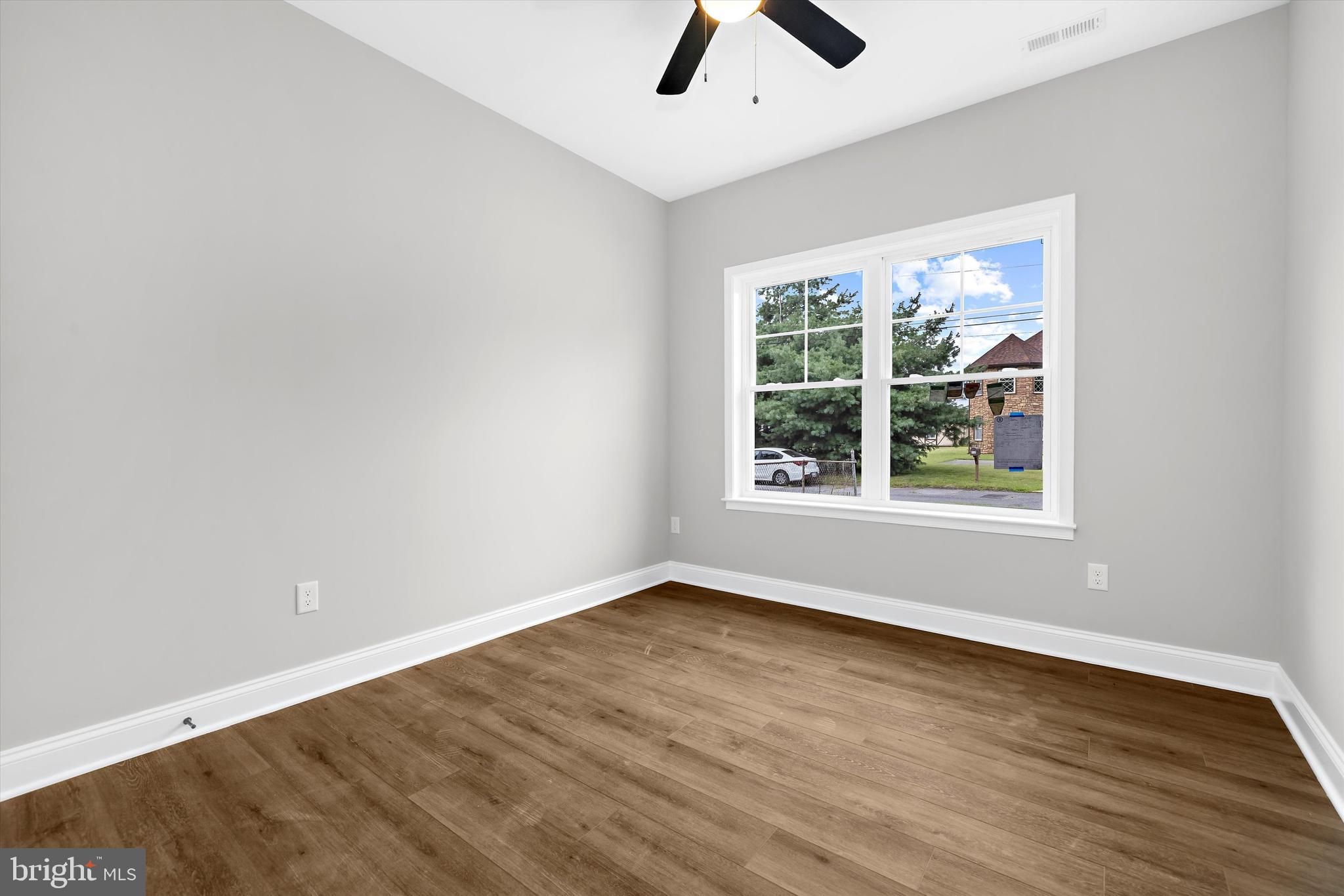 211 Greenland Beach Road Greenland Beach, MD 21226 - Photo 22 of 48 an empty room with window