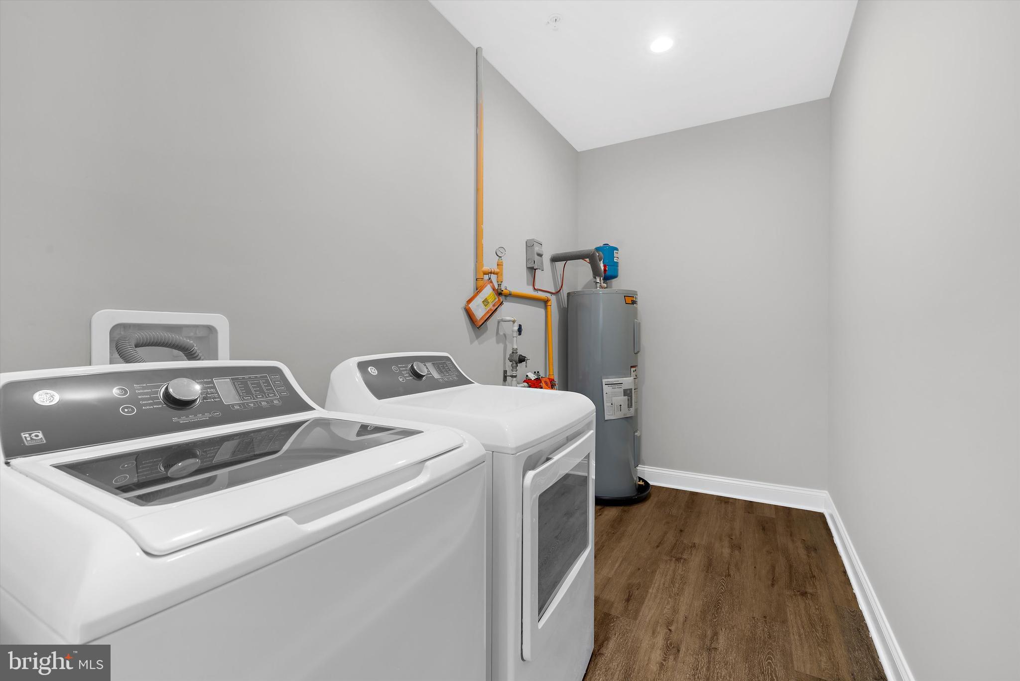 211 Greenland Beach Road Greenland Beach, MD 21226 - Photo 25 of 48 a utility room with dryer and washer