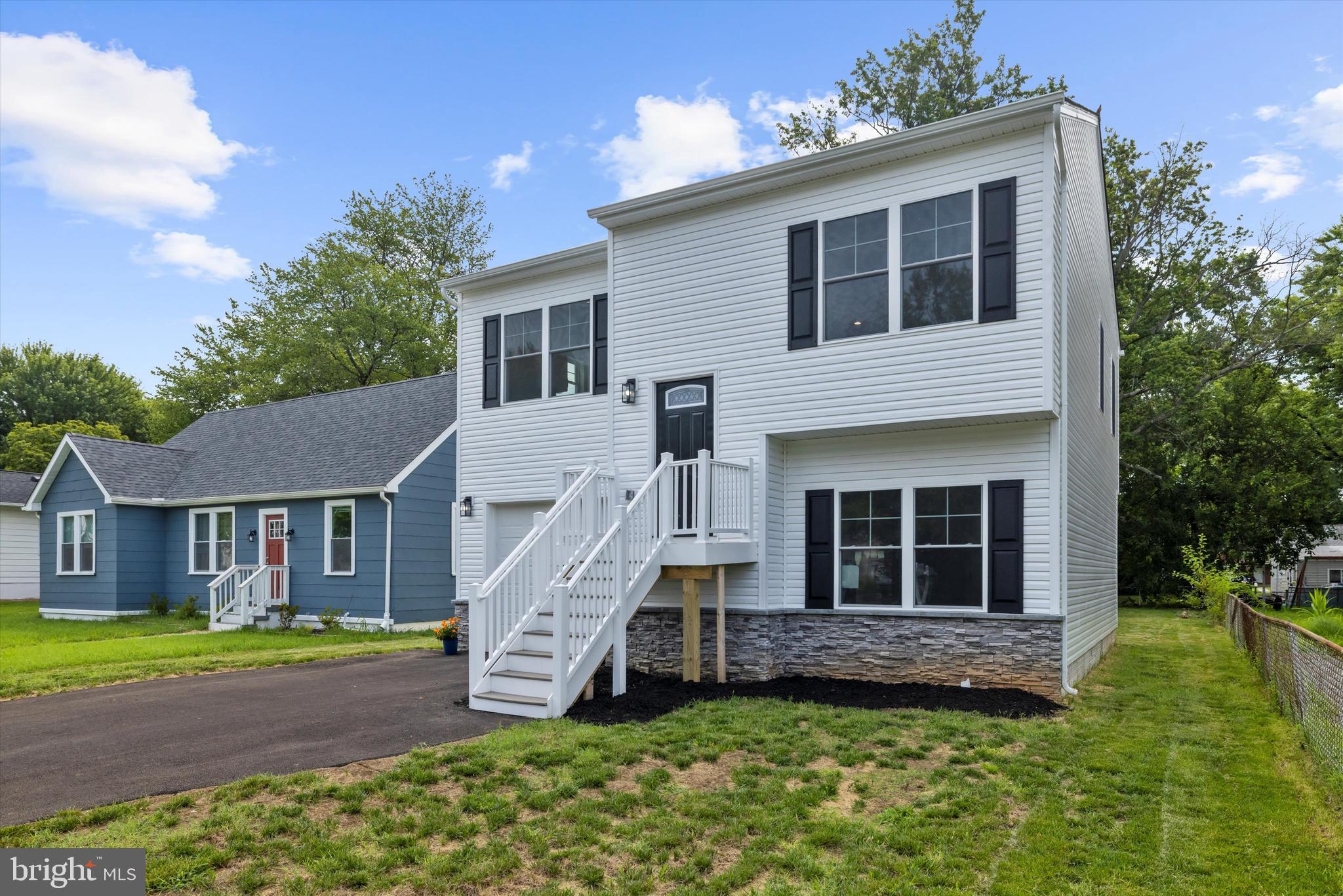 211 Greenland Beach Road Greenland Beach, MD 21226 - Photo 32 of 48 a view of a house with a yard