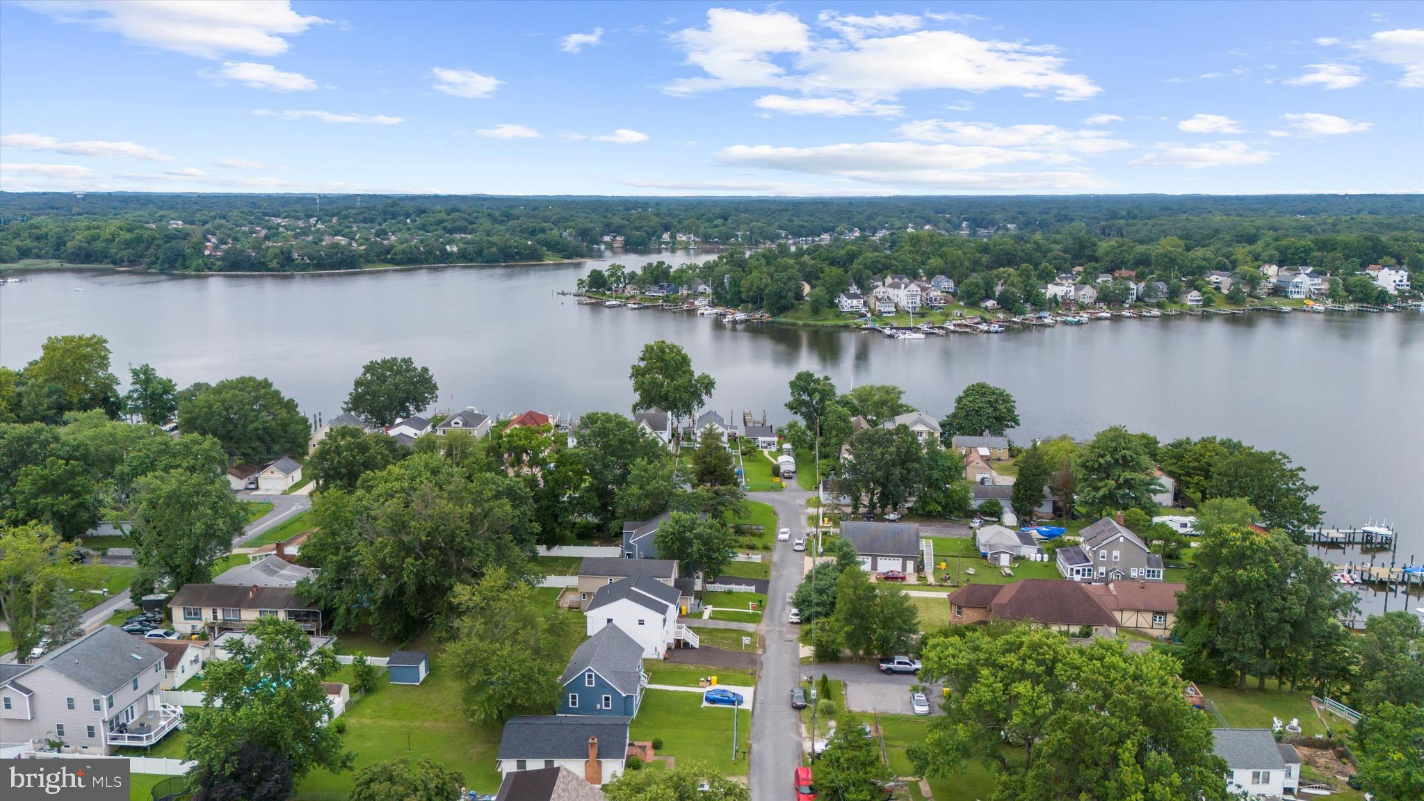 211 Greenland Beach Road Greenland Beach, MD 21226 - Photo 42 of 48 a view of a lake with a city