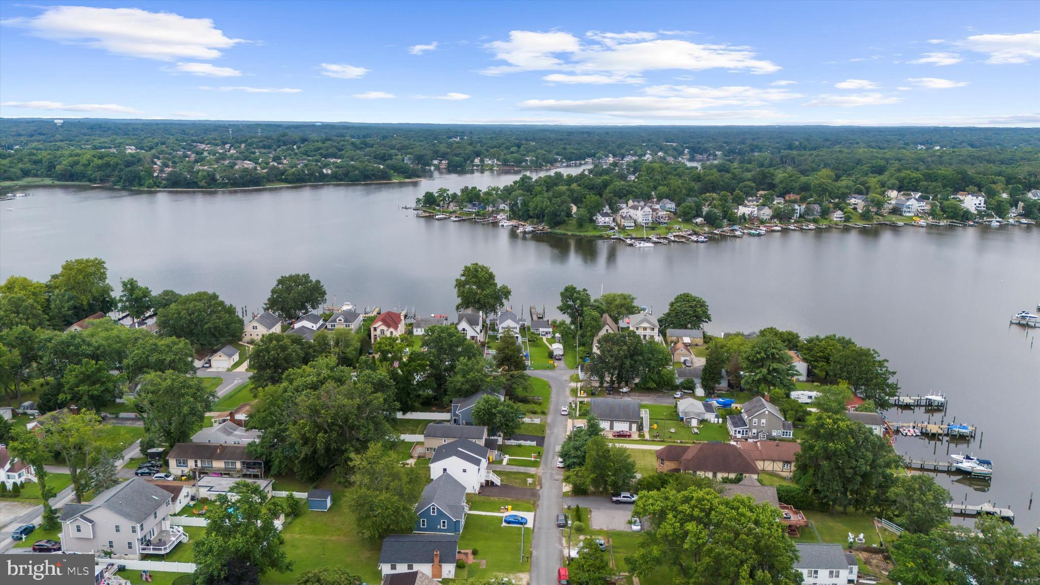 211 Greenland Beach Road Greenland Beach, MD 21226 - Photo 44 of 48 a view of a lake with a city