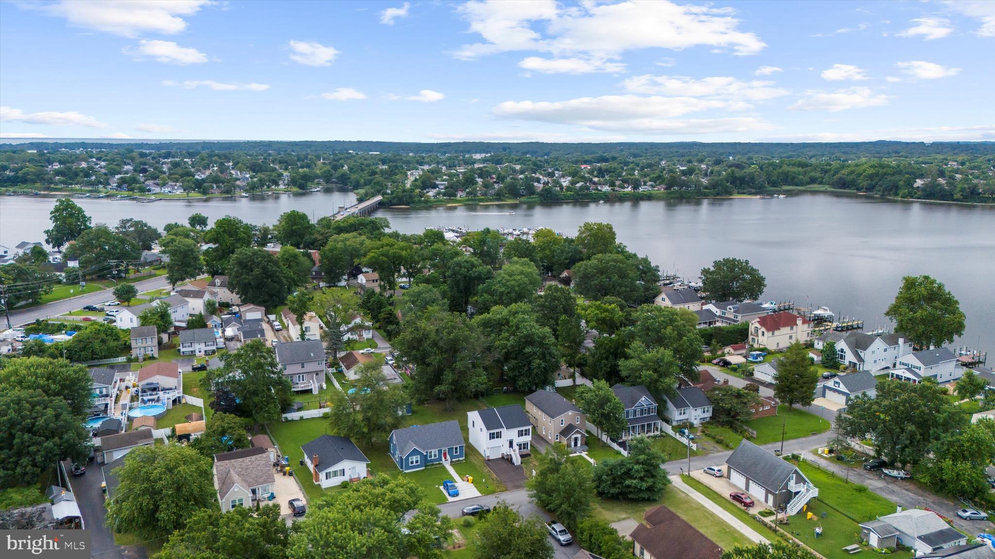 211 Greenland Beach Road Greenland Beach, MD 21226 - Photo 45 of 48 a view of a lake with a city