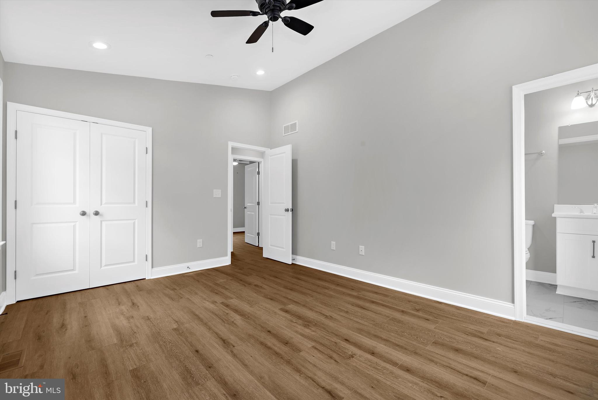 211 Greenland Beach Road Greenland Beach, MD 21226 - Photo 9 of 48 wooden floor in an empty room with a window
