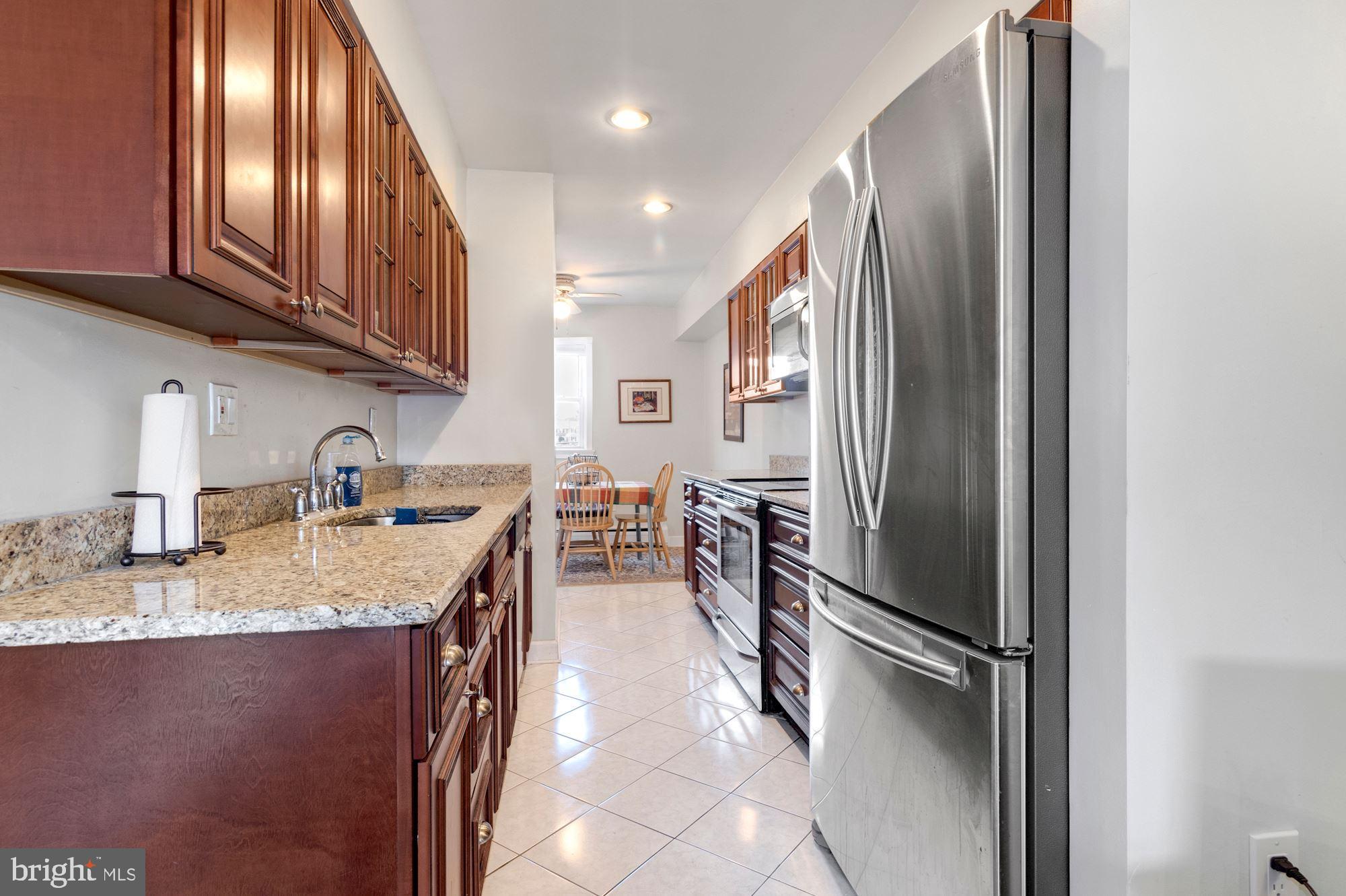 12702 Epping Terrace, Unit 8C Silver Spring, MD 20906 - Photo 2 of 28 REMODELED KITCHEN
