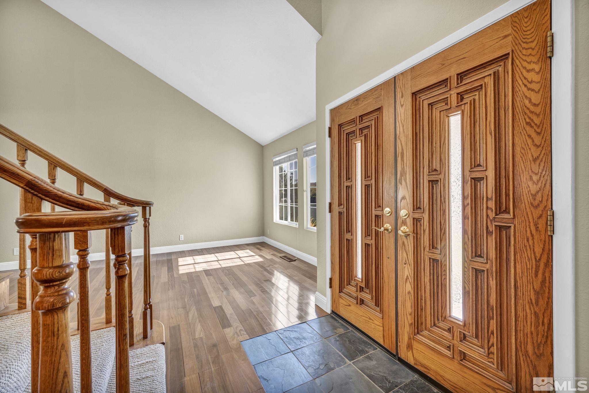 7109 Lighthouse Lane Reno, NV 89511 - Photo 7 of 40 a view of front door with wooden floor
