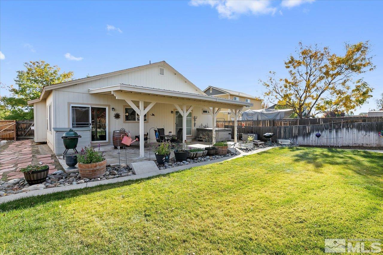 9625 Marble Creek Court Reno, NV 89506 - Photo 27 of 40 a view of a house with swimming pool and sitting area