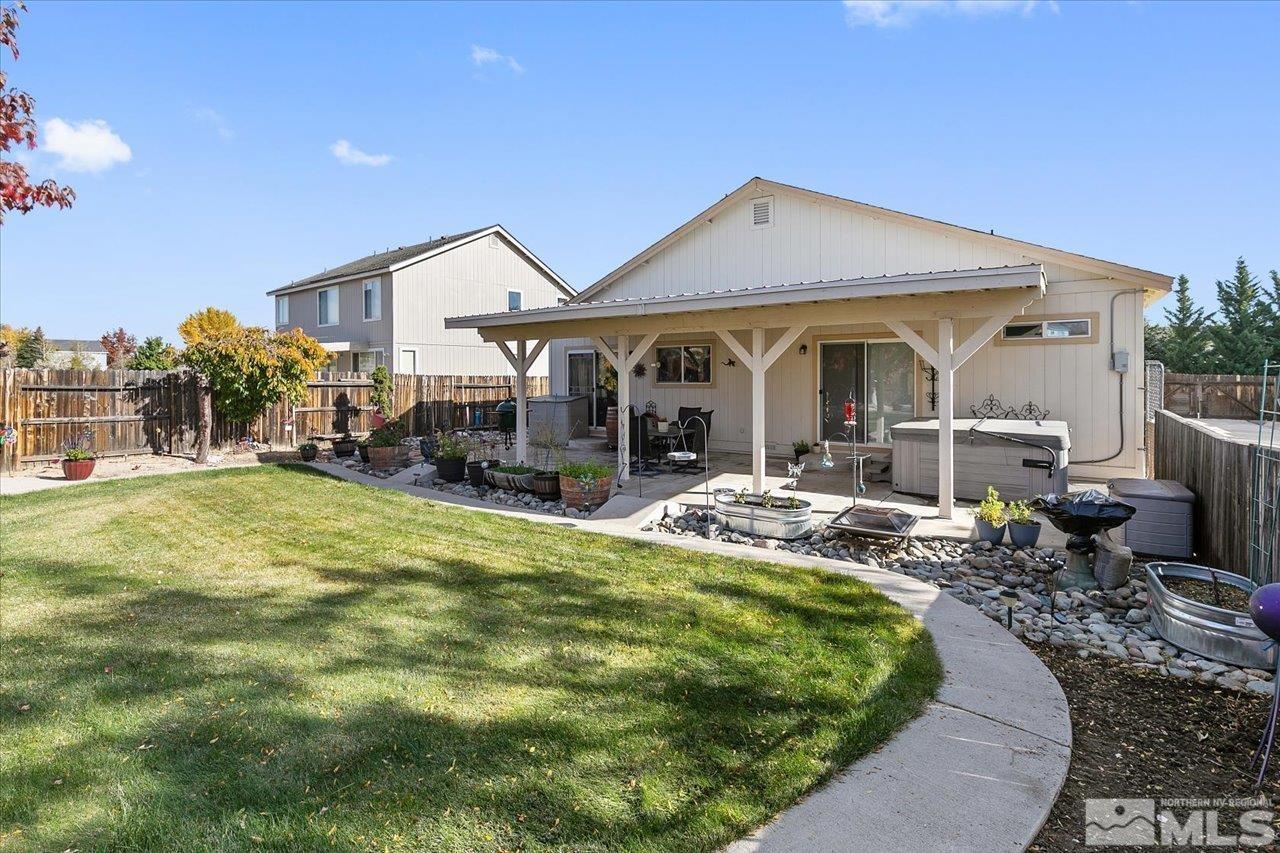 9625 Marble Creek Court Reno, NV 89506 - Photo 28 of 40 a view of a house with swimming pool and porch