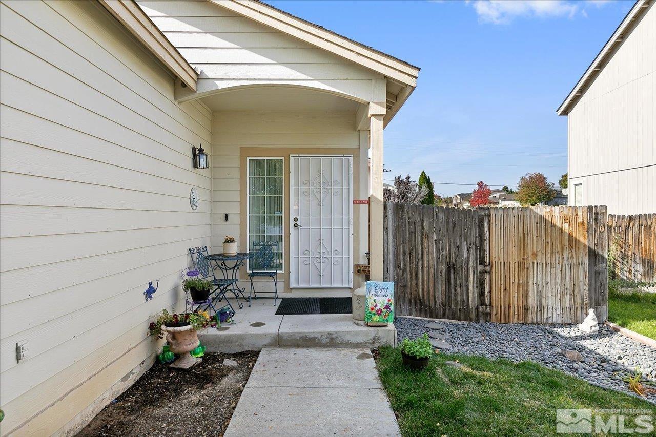 9625 Marble Creek Court Reno, NV 89506 - Photo 3 of 40 a view of a house with a backyard
