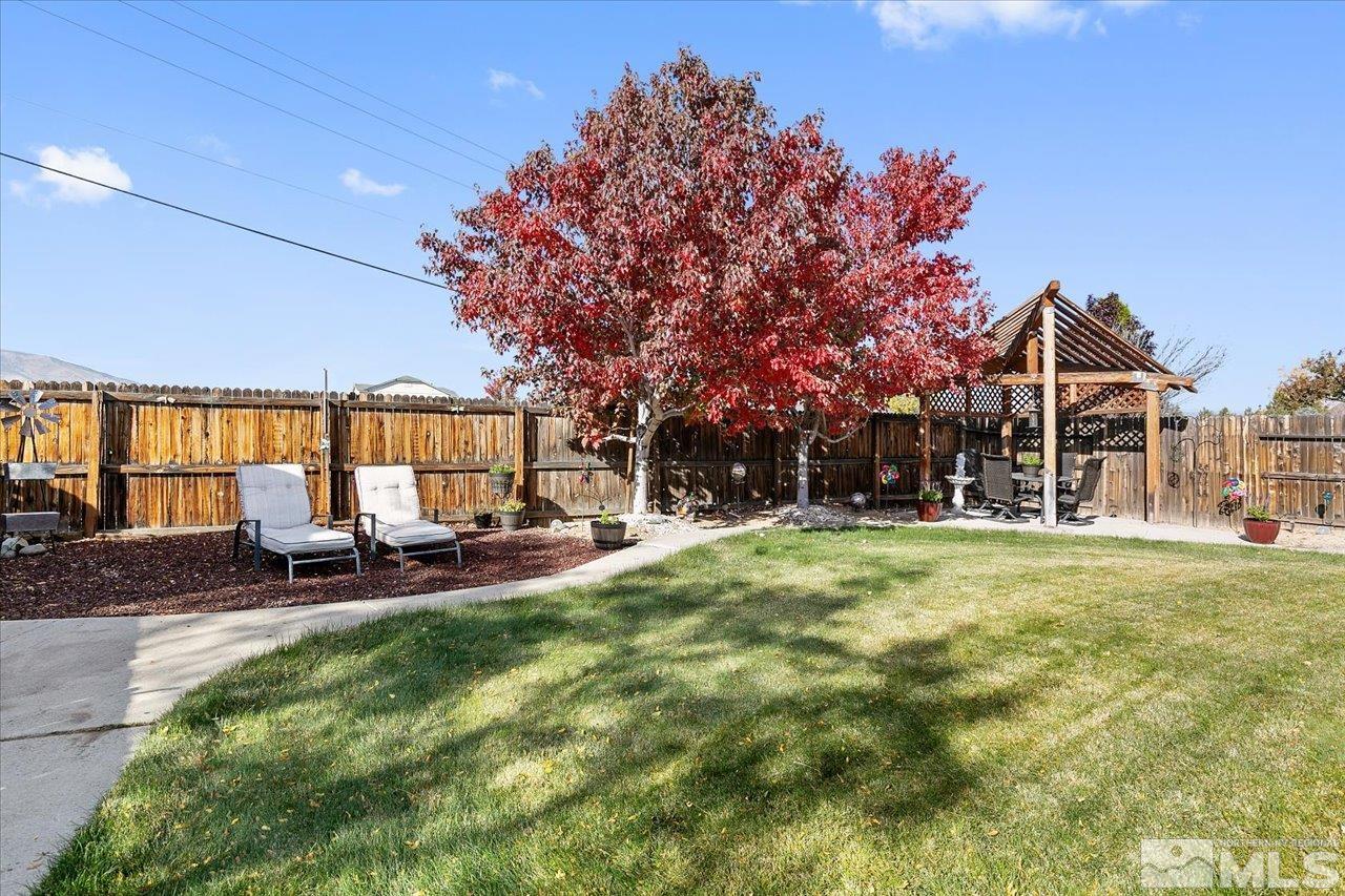 9625 Marble Creek Court Reno, NV 89506 - Photo 33 of 40 a view of a house with backyard porch and sitting area
