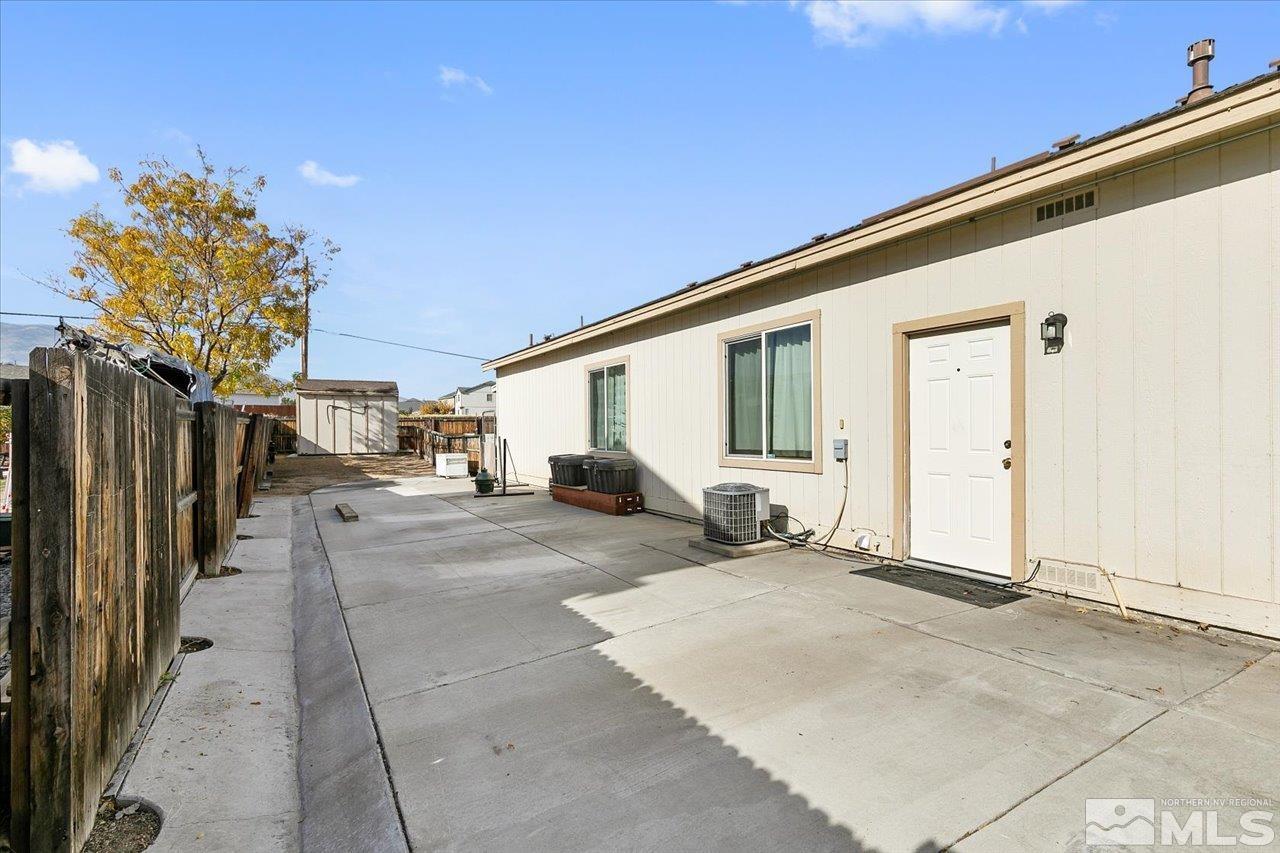 9625 Marble Creek Court Reno, NV 89506 - Photo 37 of 40 a view of a house with backyard